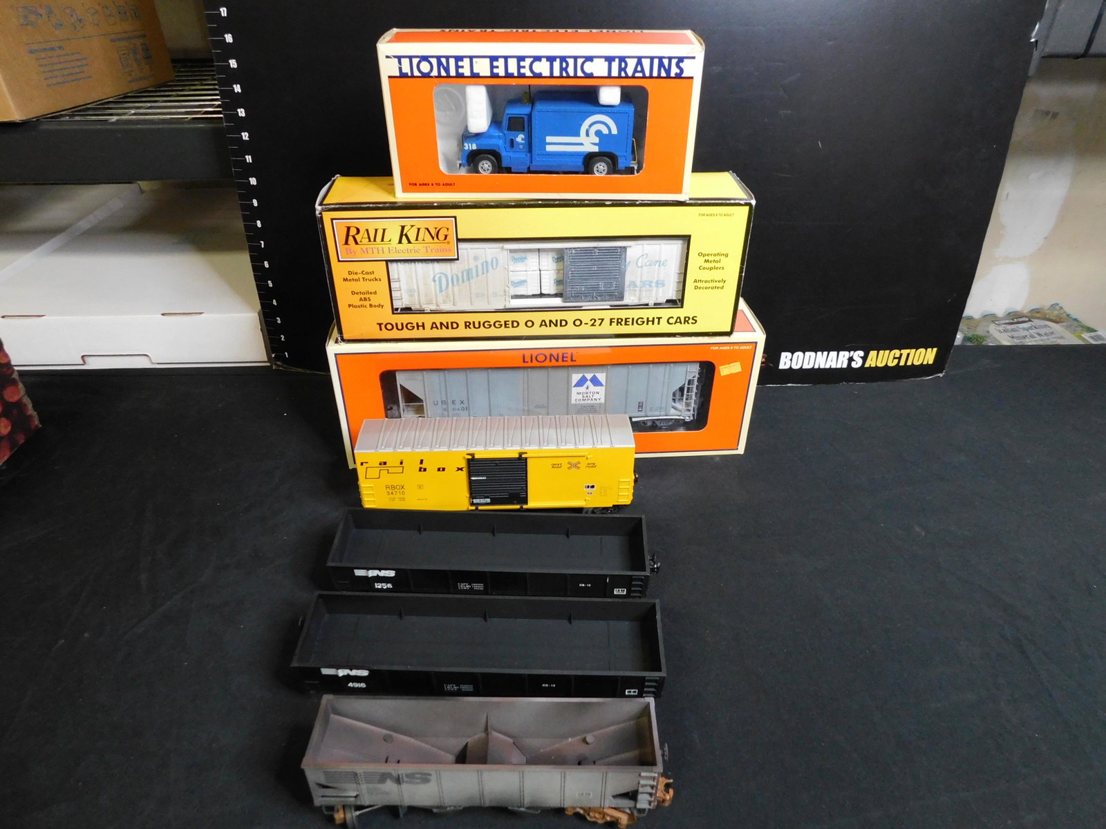 Lot of 6 Train Cars and Motorized Vehicle: Lot of 6 Train Cars and 1 Motorized Vehicle including Lionel On Track Step Van Customized with Blinking Lights 18423, MTH Rail King Domino Sugar Box Car with Load - Weathered 30-7482, Lionel Morton Sa