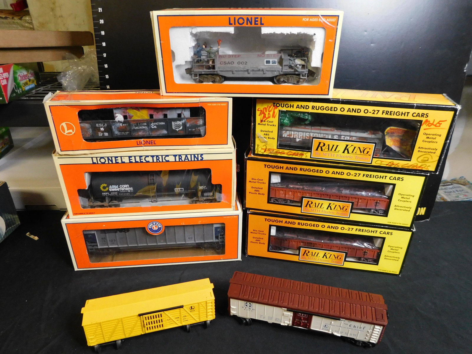 Group Lot of 9 Train Cars: Group Lot of 9 Train Cars including Lionel Post War 6656 Stock Car - EX. Cond, Lionel Post War 6672 Box Car - Ex Cond., Lionel Homemade Flatcar with Figurines, Customized Gondola with Caboose Load, Li