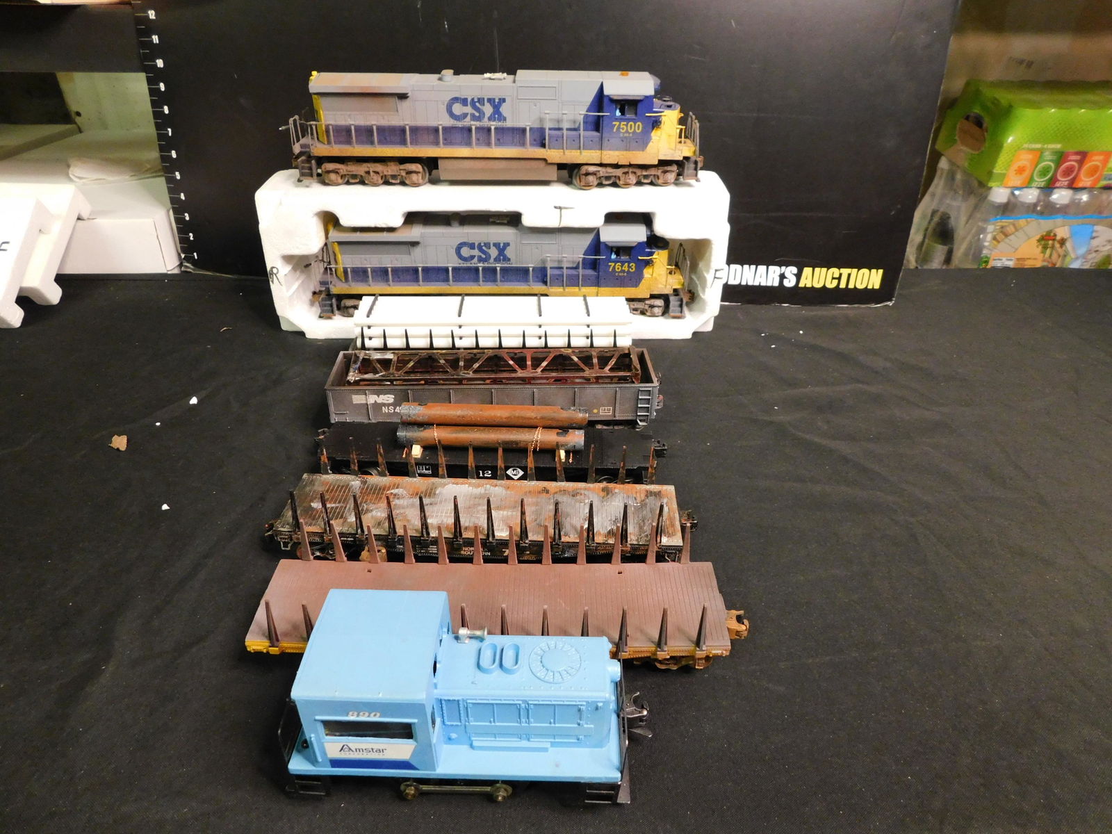 Lot of 8 Train Cars including 2 x Lionel CSX-8 Diesel: Lot of 8 Train Cars including Lionel Post War Switcher Customized for Amstar, 2 x Lionel Flatcars with Stakes Customized, Lionel Post War Flatcar with 4 Pipes Customized, Gondola with Scrapload, Lione