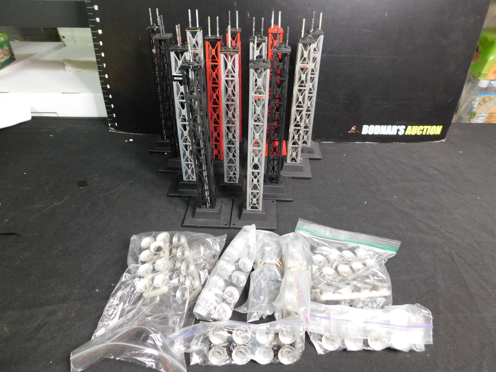 Lot of 14 Lionel 195 Railroad Yard Floodlights: Lot of 14 Lionel 195 Railroad Yard Floodlights - All Customized with Light Tower and Bulbs. You are bidding at a live sale, please read the terms and conditions. We are offering contact-less pick ups 