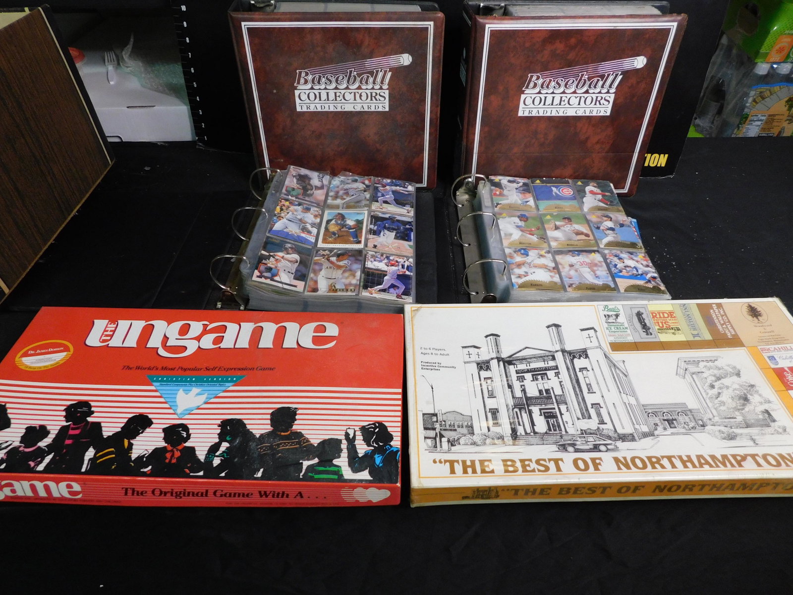 Lot with Baseball Cards and Board Games: Lot with 2 Board Games and 4 Binders of Baseball Cards. You are bidding at a live sale, please read the terms and conditions. We are offering contact-less pick ups at our South Brunswick location by A