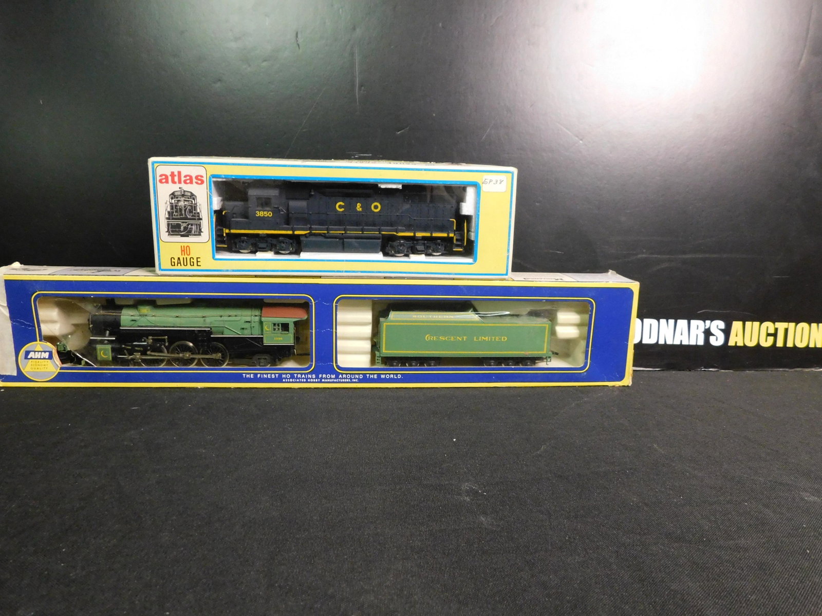Lot of 2 HO Scale Engines including AHM & Atlas: Lot of 2 HO Scale Engines including AHM 462 Crescent Limited Steam Engine and Atlas O GP38 C&O Diesel Engine. You are bidding at a live sale, please read the terms and conditions. We are offering cont