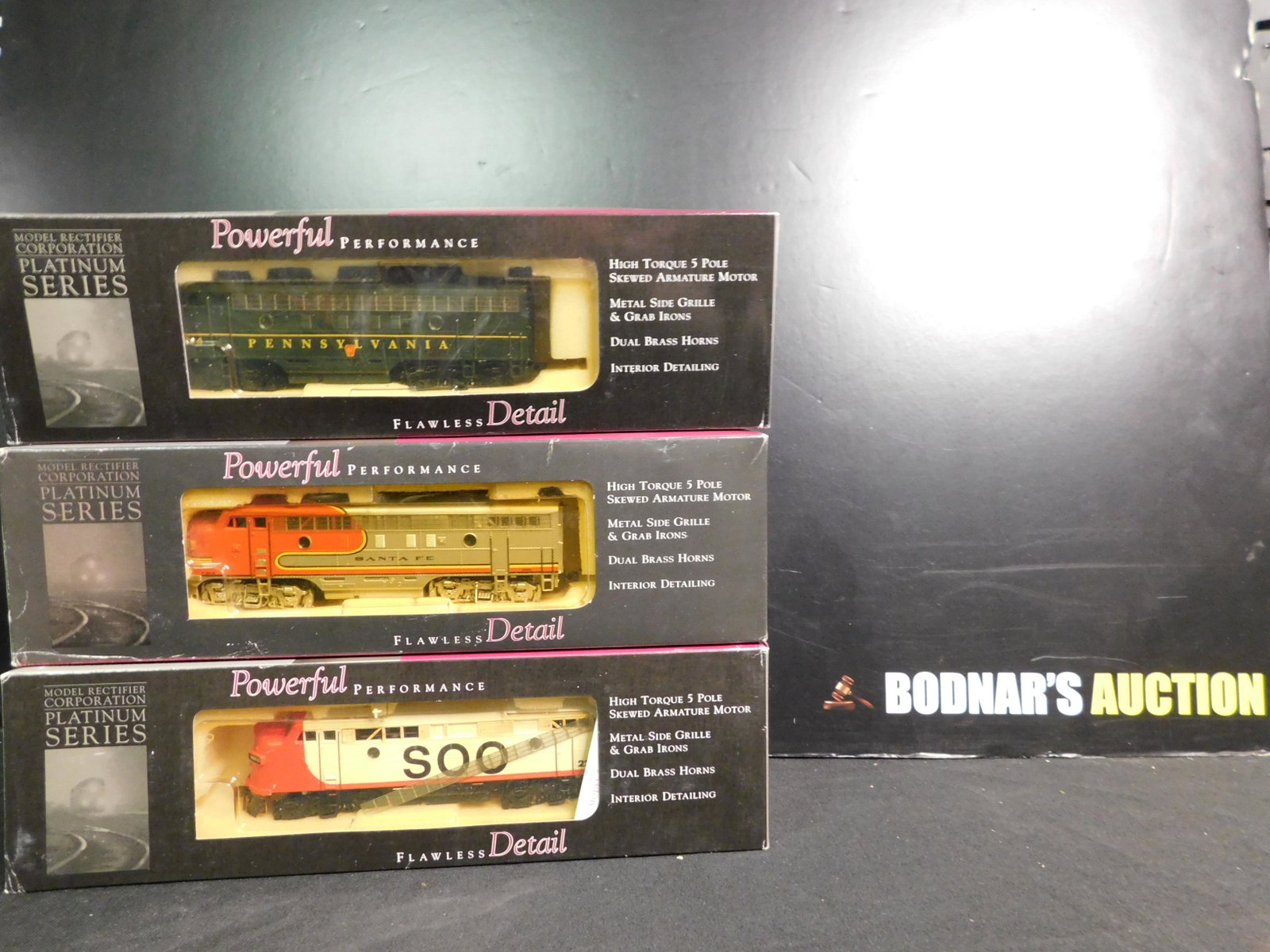 Lot of 3 MRC HO Scale Platinum Engines: Lot of 3 MRC HO Scale Platinum Series Engines including F7A Santa Fe A Unit, F7A Penn A Unit and FA7 Soo Line. You are bidding at a live sale, please read the terms and conditions. We are offering con