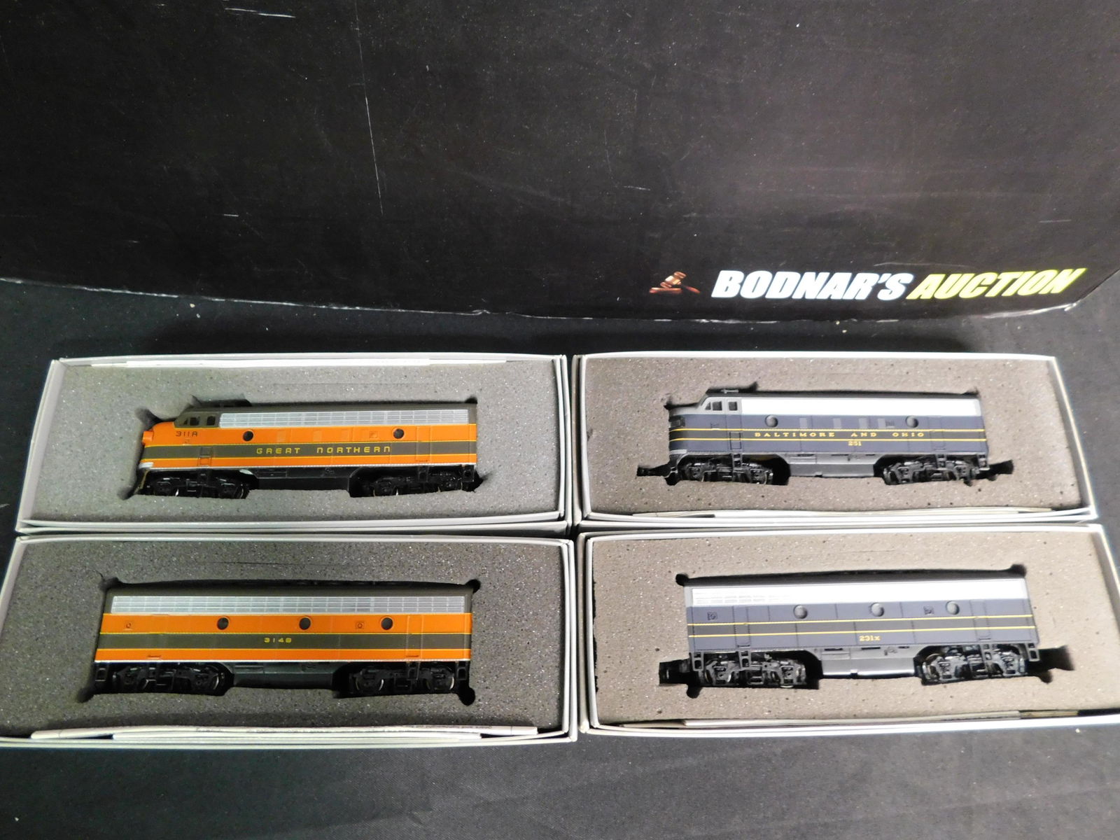 Lot of 4 Bachmann Plus Series HO Scale Engines: Lot of 4 Bachmann Plus Series HO Scale Engines including EMD F7 Great Northern A Unit, EMD F7 Great Northern B Unit, EMD F7 B&O A & B Unit. You are bidding at a live sale, please read the terms and co