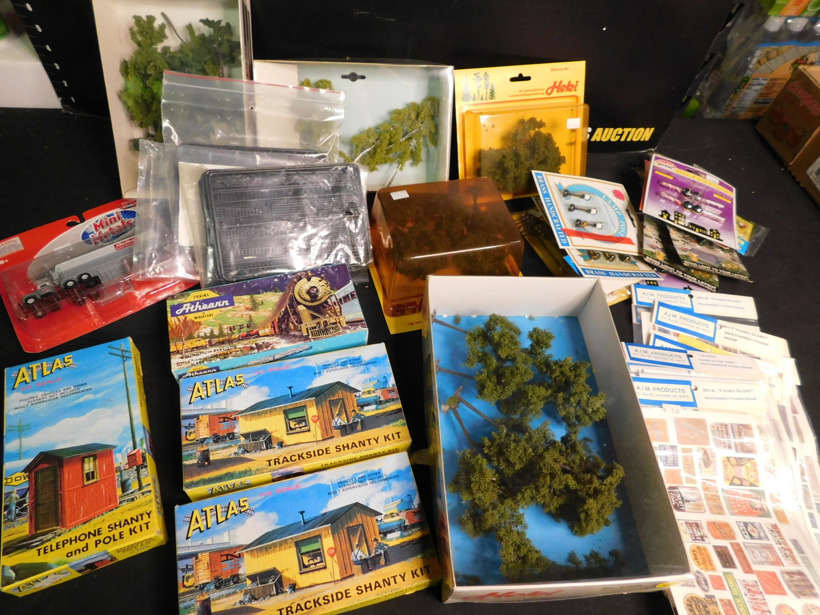 Lot of Train Accessories including Decals: Lot of Train Accessories including Trees, Shanty Kits, Decals, Lights and More. You are bidding at a live sale, please read the terms and conditions. We are offering contact-less pick ups at our South