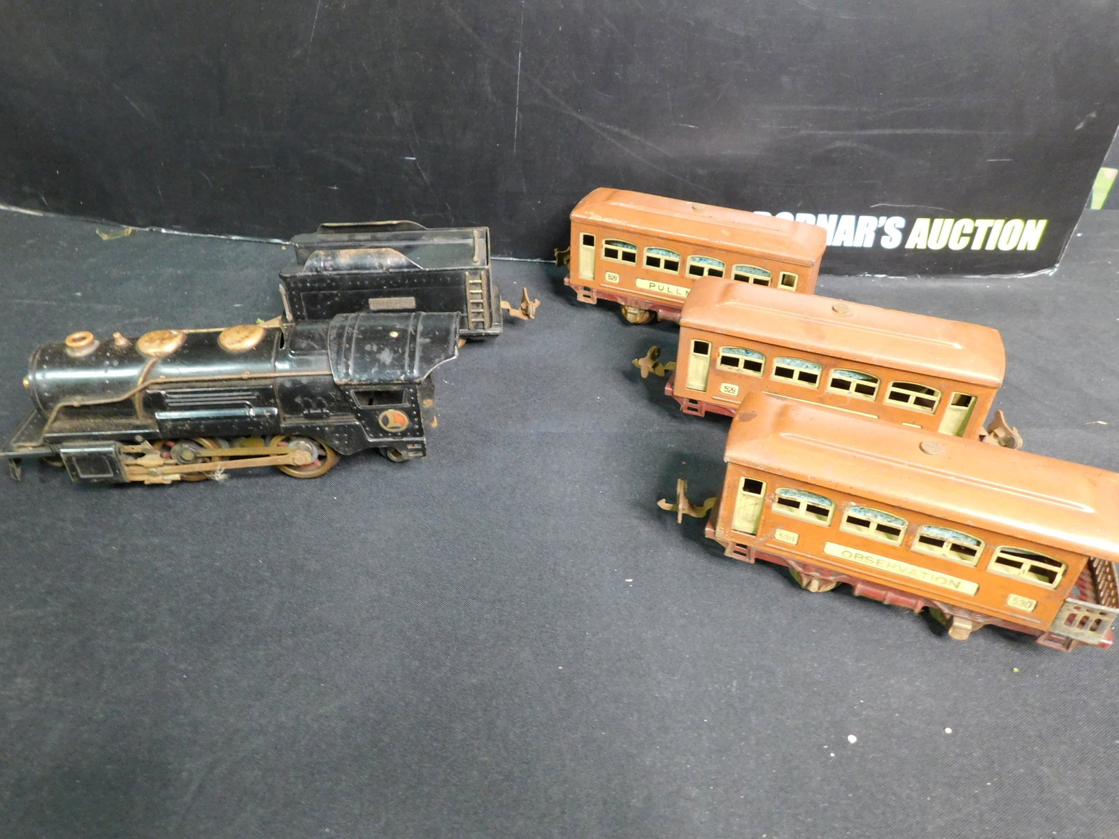 Pre-War Lionel O Gauge Tin Plate Passenger Set with: Pre-War Lionel O Gauge Tin Plate Passenger Set with 259 E Steam Locomotive - Heavy Rust and Pick Up Rollers Sottered on and the Motor is frozen. Also included are 2 x 529 Passenger Cars and 1 530 Obse
