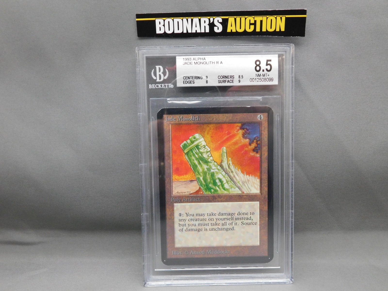 MTG Jade Monolith 1993 Alpha - BGS Graded: Magic the Gathering - Jade Monolith R A - Alpha Set 1993. Beckett Graded 8.5 NM-MT+. Centering 9, Edges 8, Corners 7.5 and Surface 9. Serial #0012508099. You are bidding at a live sale, please read th