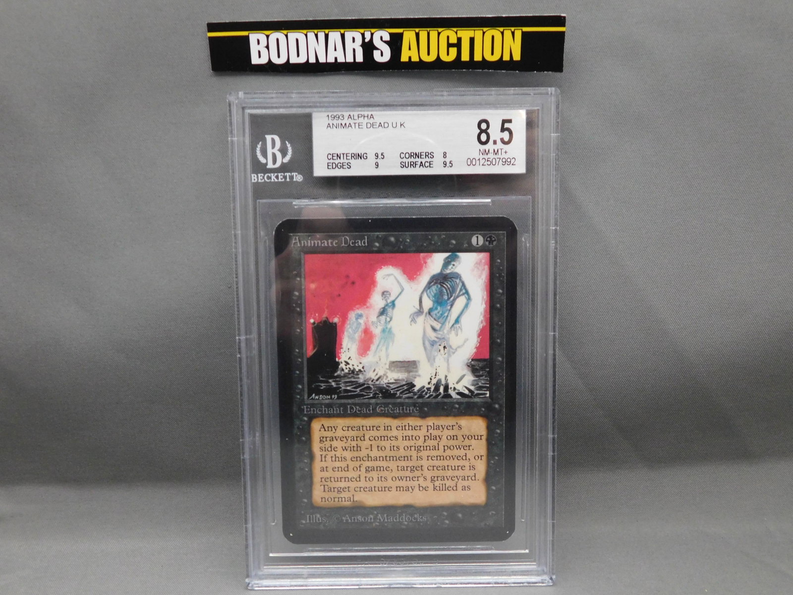 MTG Animate Dead 1993 Alpha - BGS Graded: Magic the Gathering - Animate Dead U K - Alpha Set 1993. Beckett Graded 8.5 NM-MT+. Centering 9.5, Edges 9, Corners 8 and Surface 9.5. Serial #0012507992. You are bidding at a live sale, please read t