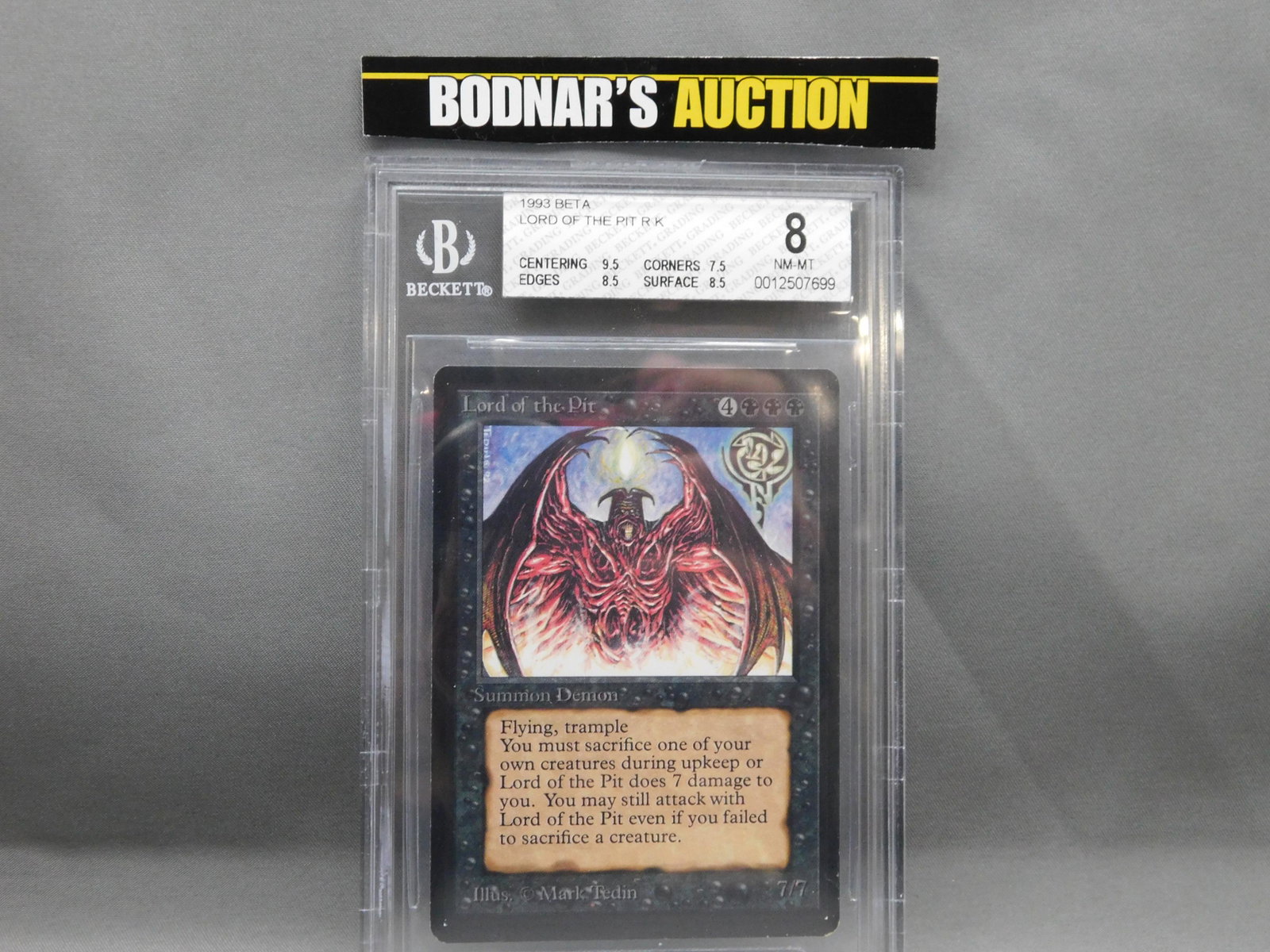 MTG Lord of the Pit 1993 Beta - BGS Graded: Magic the Gathering - Lord of the Pit R K - Beta Set 1993. Beckett Graded 8 NM-MT. Centering 9.5, Edges 8.5, Corners 7.5 and Surface 8.5. Serial #0012507699. You are bidding at a live sale, please rea