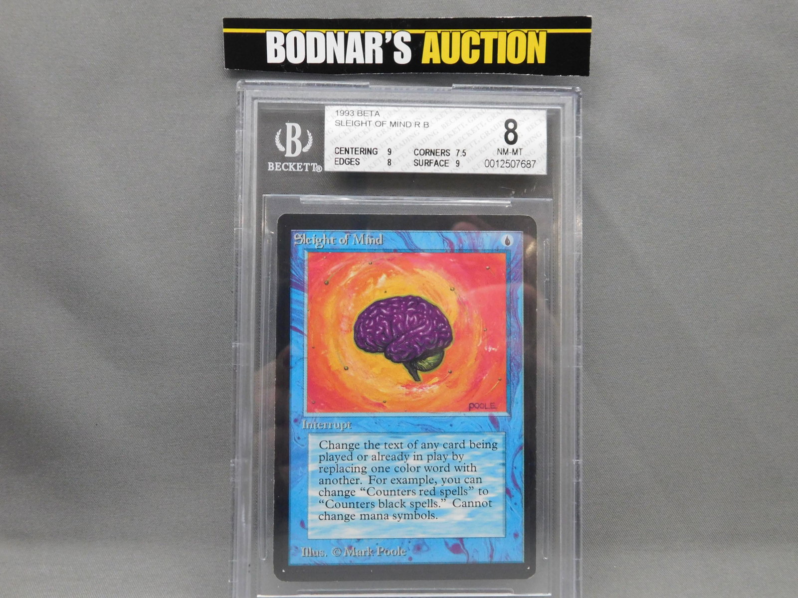 MTG Sleight of Mind 1993 Beta - BGS Graded: Magic the Gathering - Sleight of Mind R B - Beta Set 1993. Beckett Graded 8 NM-MT. Centering 9, Edges 8, Corners 7.5 and Surface 9. Serial #0012507687. You are bidding at a live sale, please read the 
