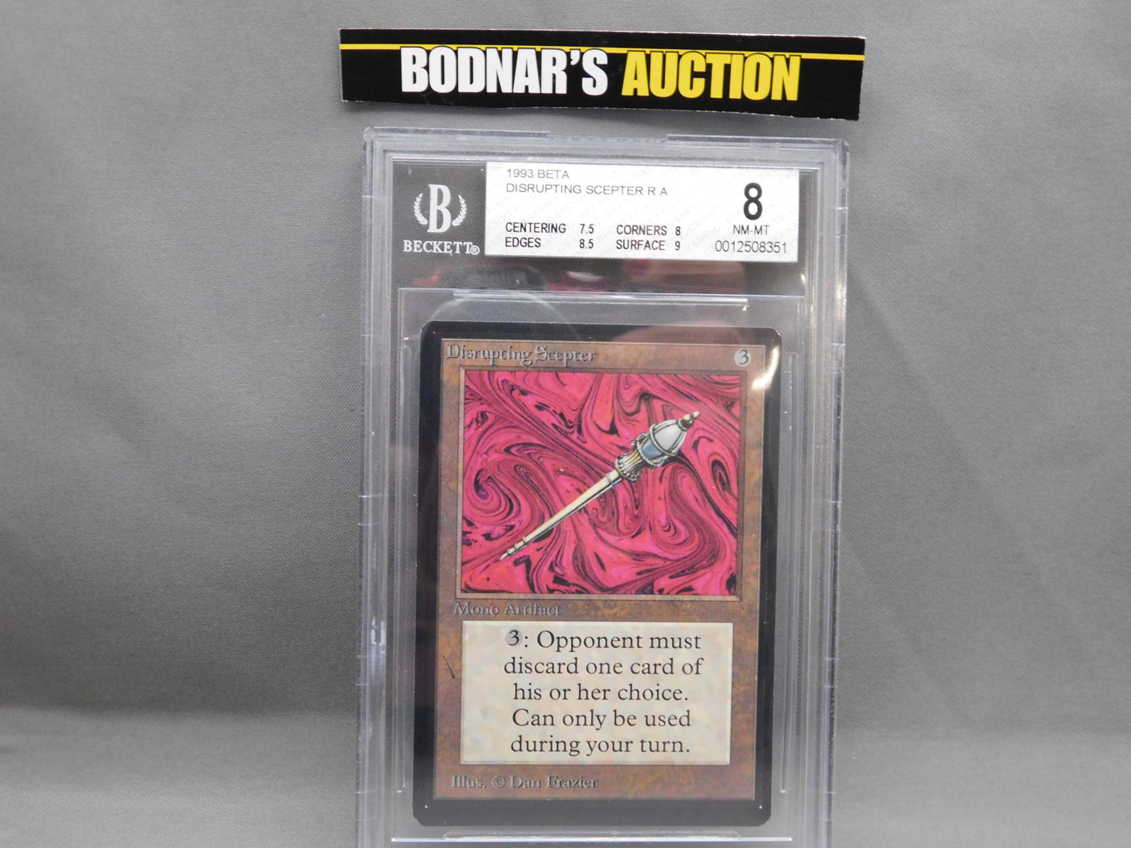 MTG Disrupting Scepter 1993 Beta - BGS Graded: Magic the Gathering - Disrupting Scepter R A - Beta Set 1993. Beckett Graded 8 NM-MT. Centering 7.5, Edges 8.5, Corners 8 and Surface 9. Serial #0012508351. You are bidding at a live sale, please read