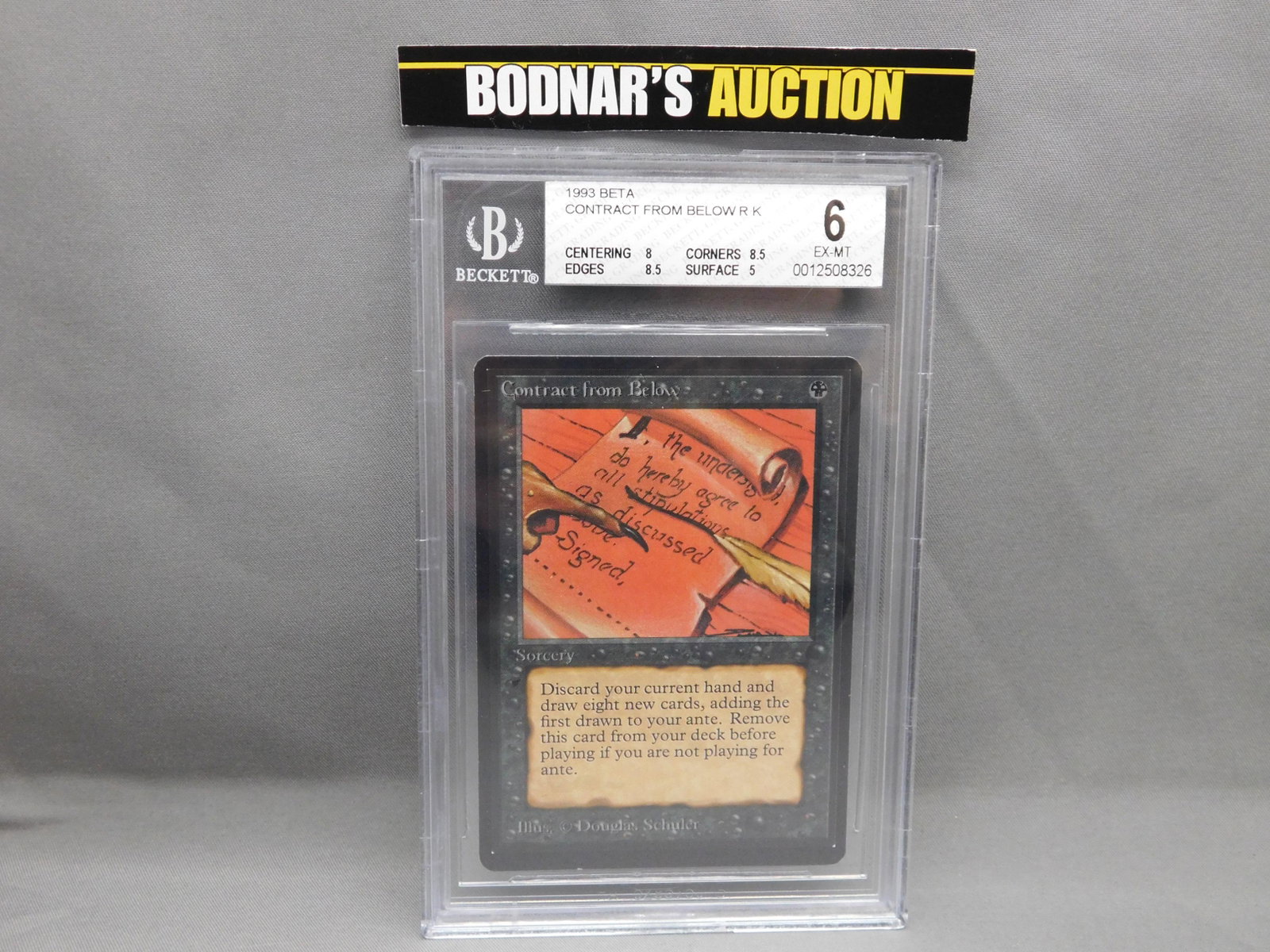 MTG Contract From Below 1993 Beta - BGS Graded: Magic the Gathering - Contract From Below R K - Beta Set 1993. Beckett Graded 6 EX-MT. Centering 8, Edges 8.5, Corners 8.5 and Surface 5. Serial #0012508326. You are bidding at a live sale, please rea