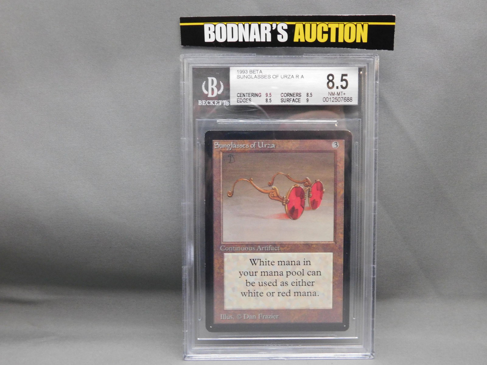MTG Sunglasses of Urza 1993 Beta - BGS Graded: Magic the Gathering - Sunglasses of Urza R A - Beta Set 1993. Beckett Graded 8.5 NM-MT+. Centering 9.5, Edges 8.5, Corners 8.5 and Surface 9. Serial #0012507688. You are bidding at a live sale, please