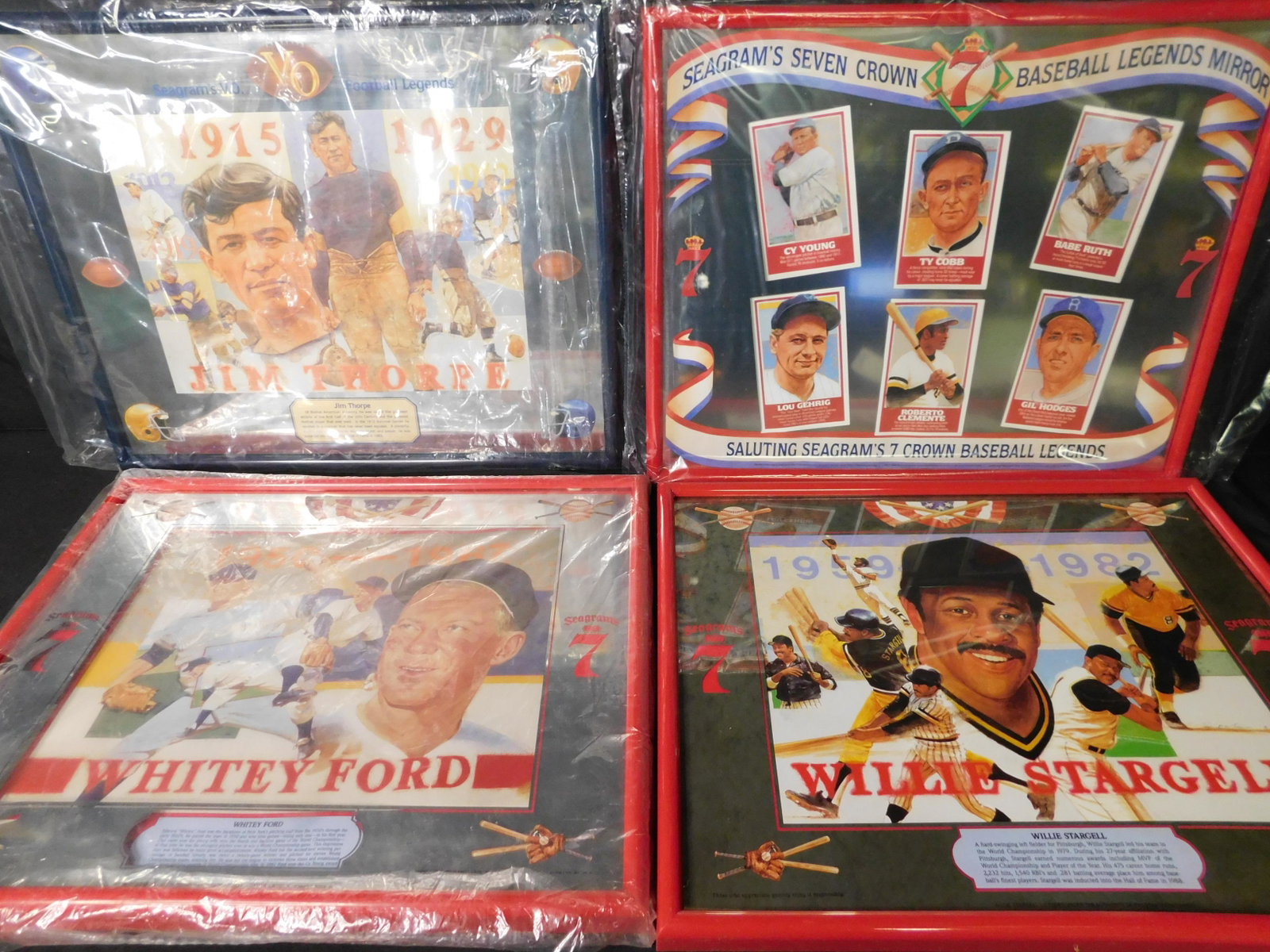 Lot of 4 Seagrams 7 and VO Advertisment Sports Mirrors: Lot of 4 Seagrams 7 and VO Sports Mirrors and Framed Picture. Included in this lot is Baseball Legends, Whitey Ford and Jim Thorpe Mirror. Also included is a Willie Stargell framed poster. This sale w