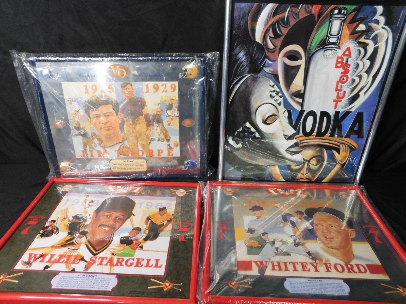 Lot of 4 Bar Advertisment - Seagrams 7, VO and Absolute: Lot of 4 Seagrams 7, VO and Absolute Vodka Framed Posters and Mirrors. Included in this lot is Seagrams 7 Willie Stargell Poster, Sea 7 Whitey Ford Mirror and VO Jim Thorpe Mirror. Also included is a 