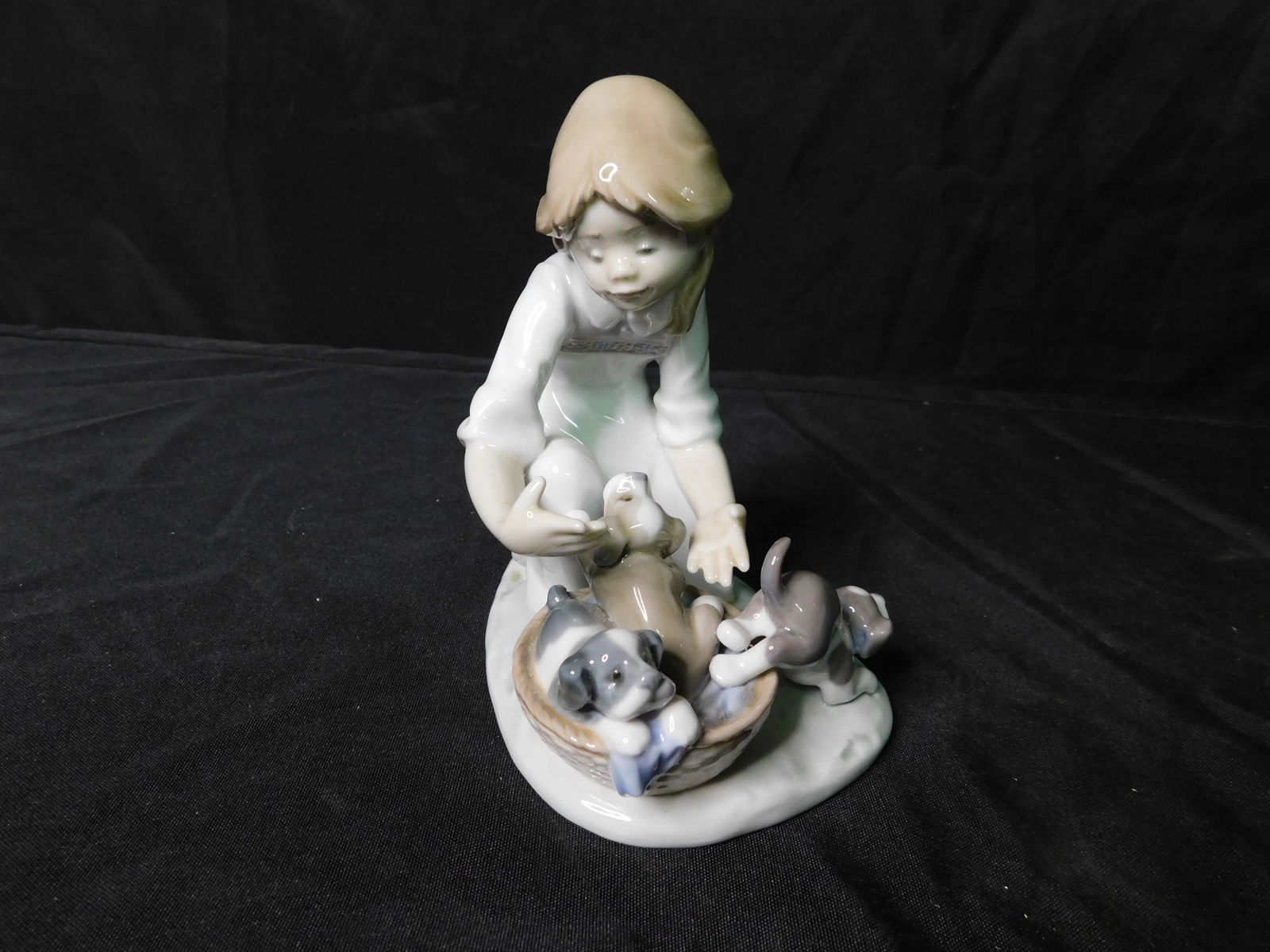 Lladro Little Girl with Puppies: Lladro Little Girl with Puppies #5595. Measures This sale will be broadcast live on sale day with an auctioneer and caller calling full descriptions of each lot being sold, as well as video feed of ea