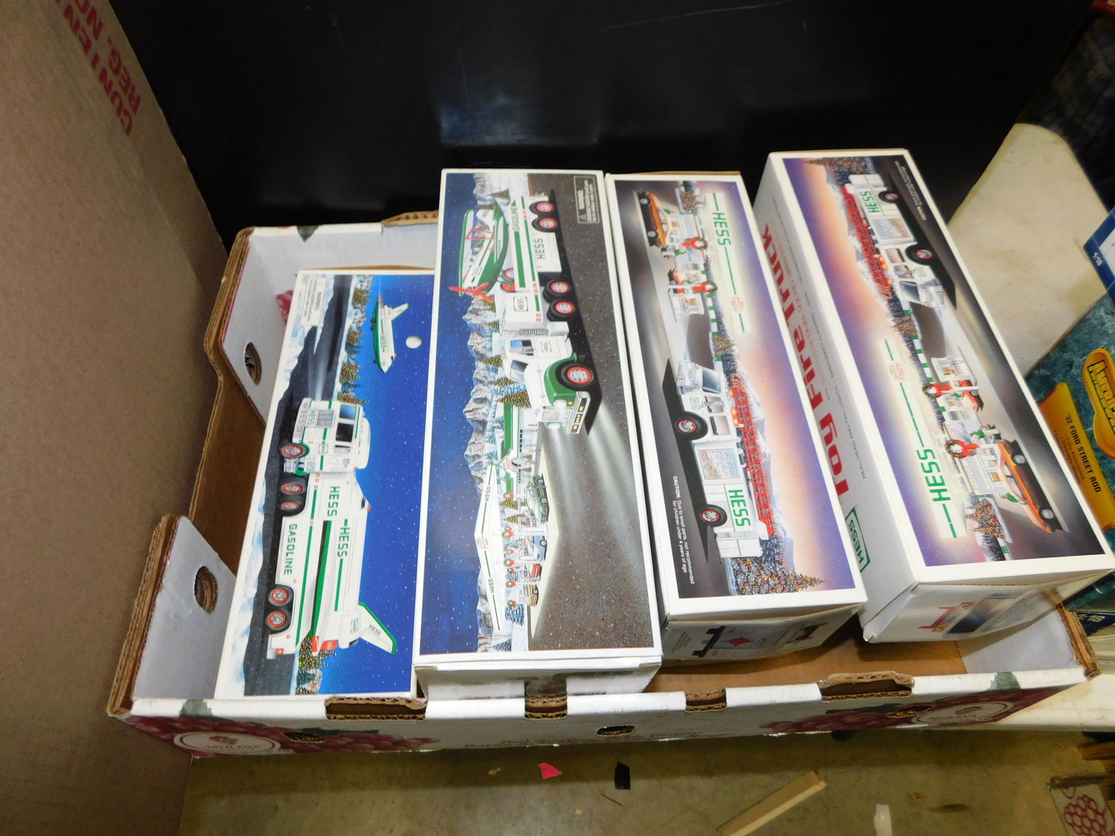 Lot of 7 Hess Trucks in Box (1 of 1)