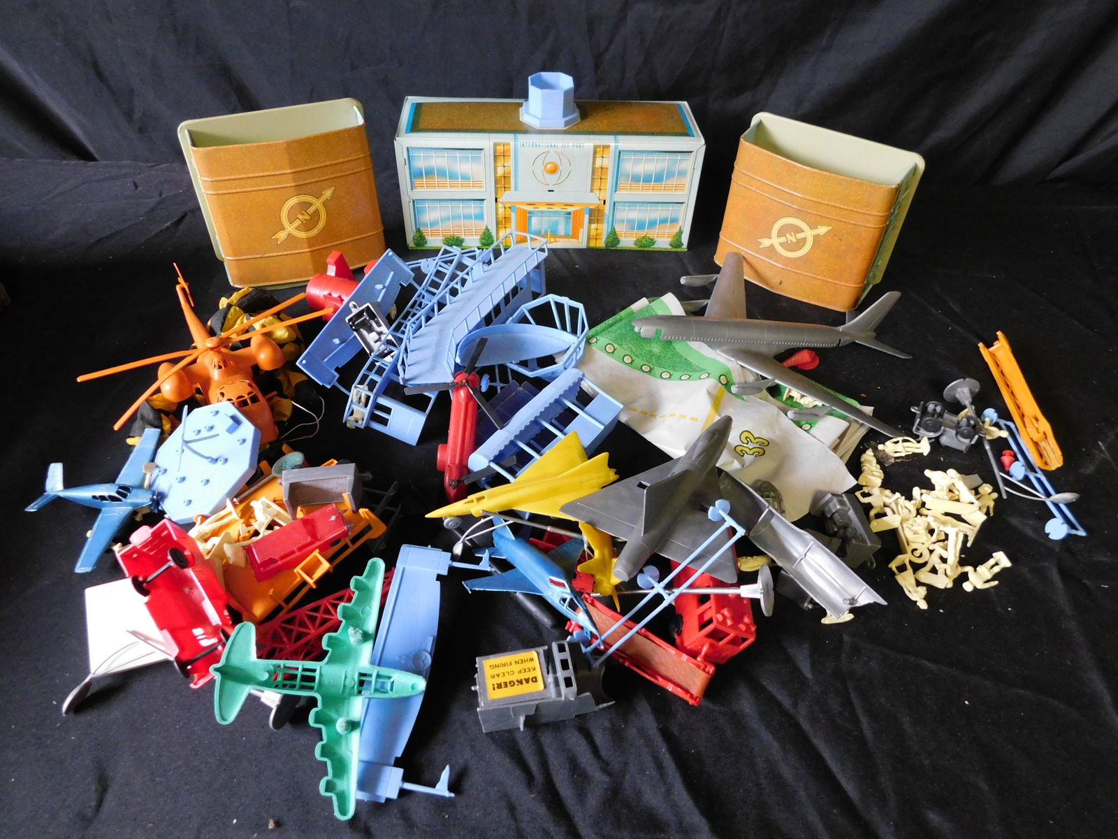 Lot of Toy Planes and Tin International Jet Port (1 of 1)