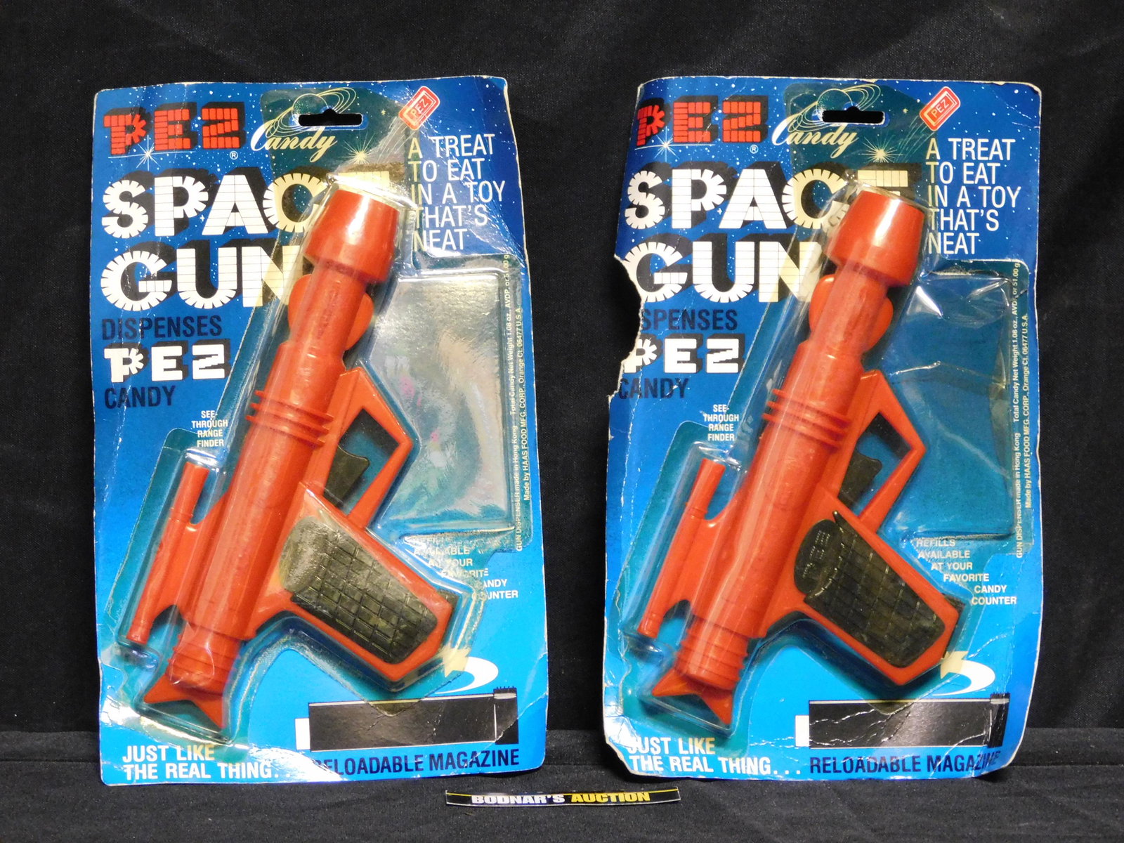 Lot of 2 Vintage Red Space Gun Pez in Packages: Lot of 2 Vintage Red Space Gun Pez in Packages. Missing the Candy. Packaging has some condition issues. You are bidding at a live sale, please read the terms and conditions. We are offering contact-le