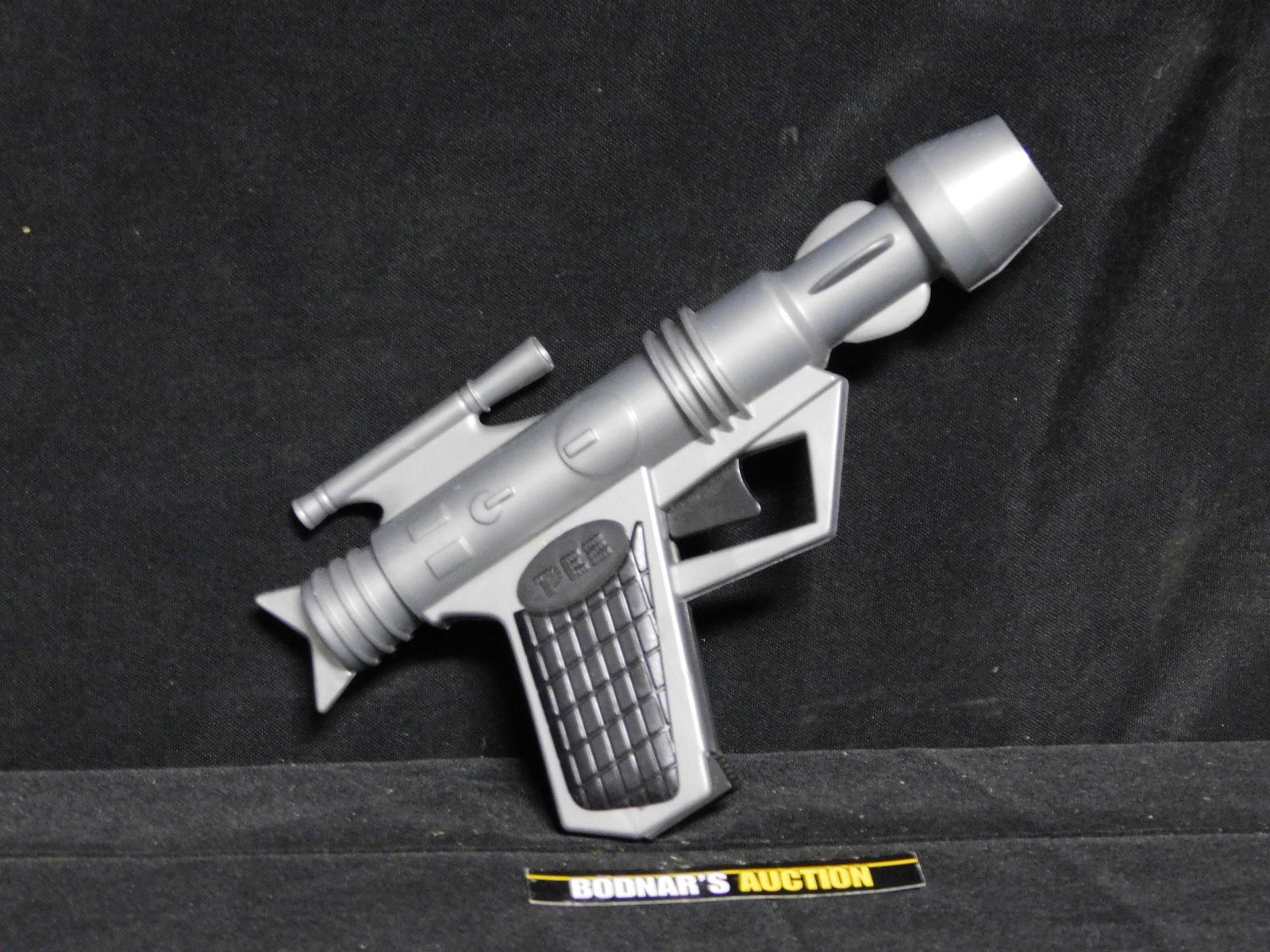 Vintage Silver Space Gun Pez: Vintage Silver Space Gun Pez. You are bidding at a live sale, please read the terms and conditions. We are offering contact-less pick ups at our South Brunswick location by APPOINTMENT ONLY on the Fri