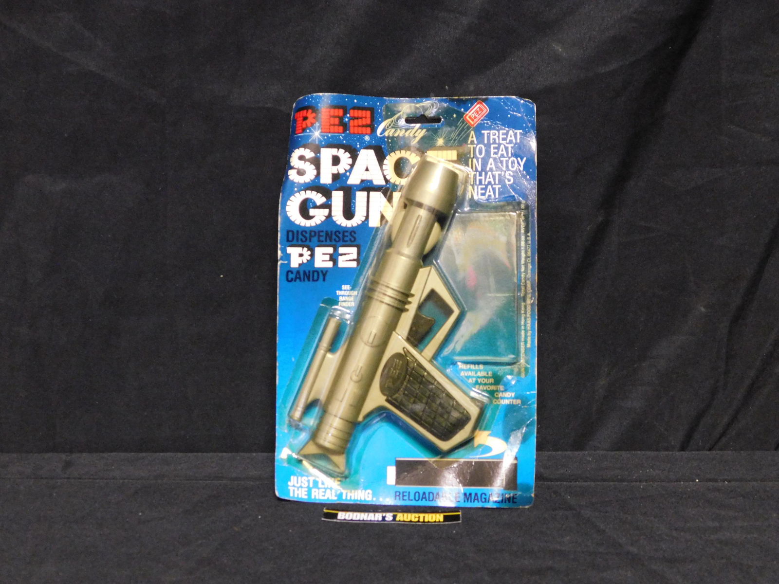 Vintage Silver Space Gun Pez in Package: Vintage Silver Space Gun Pez in Package. Missing Candy. You are bidding at a live sale, please read the terms and conditions. We are offering contact-less pick ups at our South Brunswick location by A