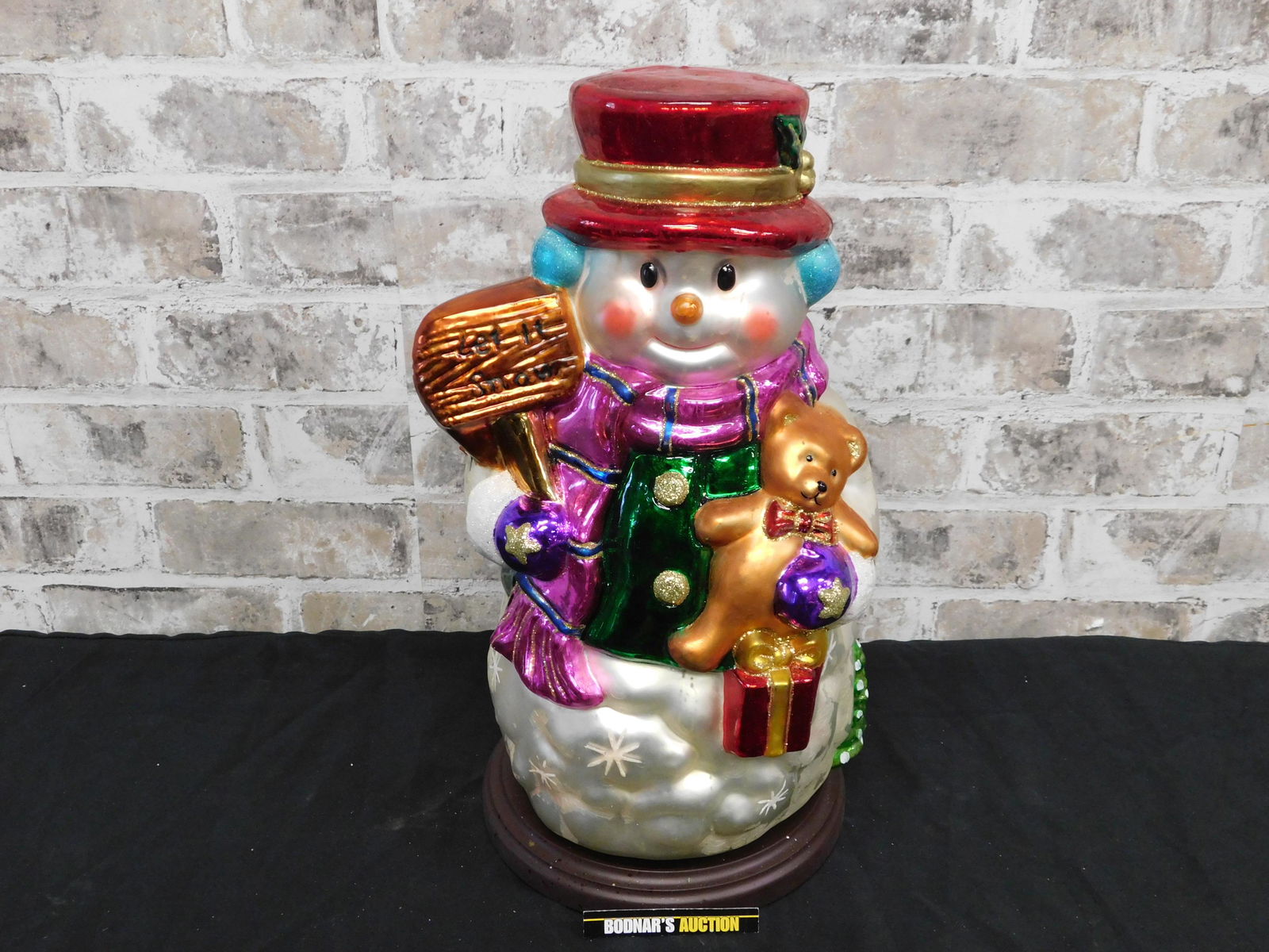 Thomas Pacconi Classics Snowman Blown Glass Decoration: Thomas Pacconi Classics Snowman Blown Glass Decoration. Some paint loss. Measures approx. 16" tall. This sale will be broadcast live on sale day with an auctioneer and caller calling full descriptions