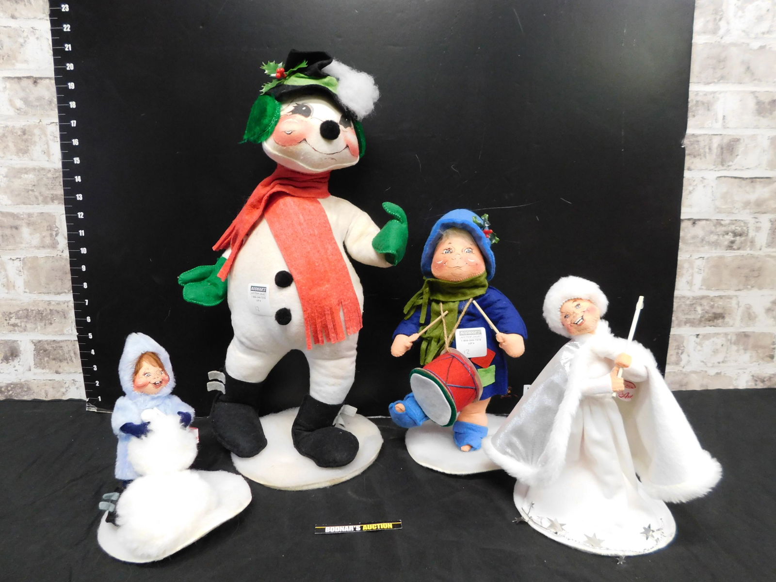 Lot of 4 Annalee Christmas Decorations: Lot of 4 Annalee Christmas Decorations. This sale will be broadcast live on sale day with an auctioneer and caller calling full descriptions of each lot being sold, as well as video feed of each lot.