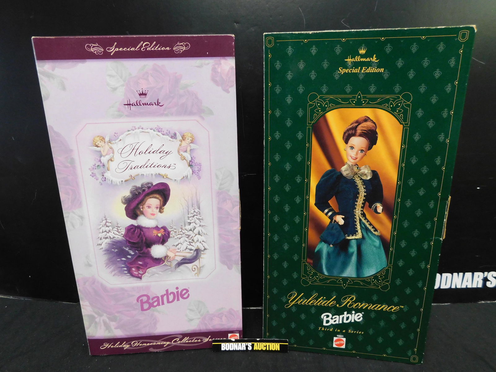 Lot of 2 Barbie's: Lot of 2 Barbie's including Holiday Traditions and Yuletide Romance. This sale will be broadcast live on sale day with an auctioneer and caller calling full descriptions of each lot being sold, as wel