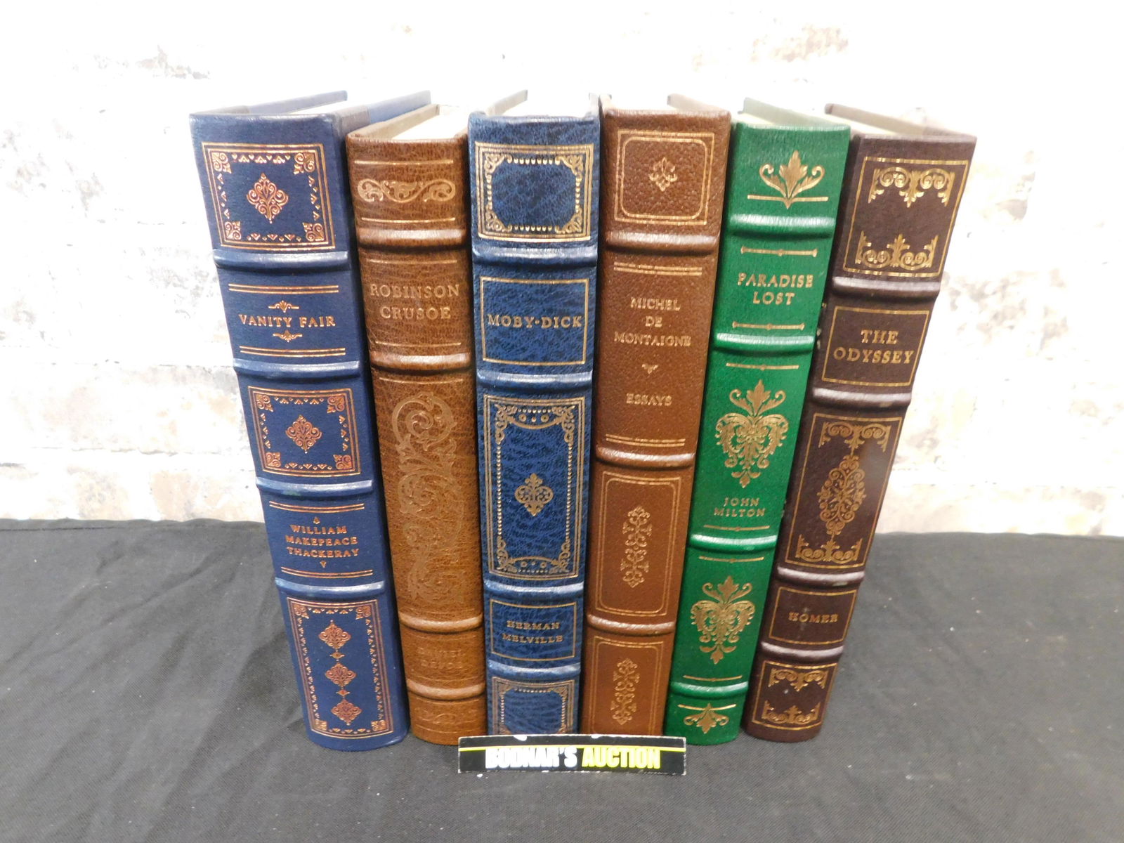 Lot of 6 Franklin Library Books: Lot of 6 Franklin Library Books. Included in this lot are Vanity Fair by William Makepeace Thackeray, Robinson Crusoe by Danial Defoe, Moby Dick by Herman Melville, Essays by Michel De Montaigne, Para