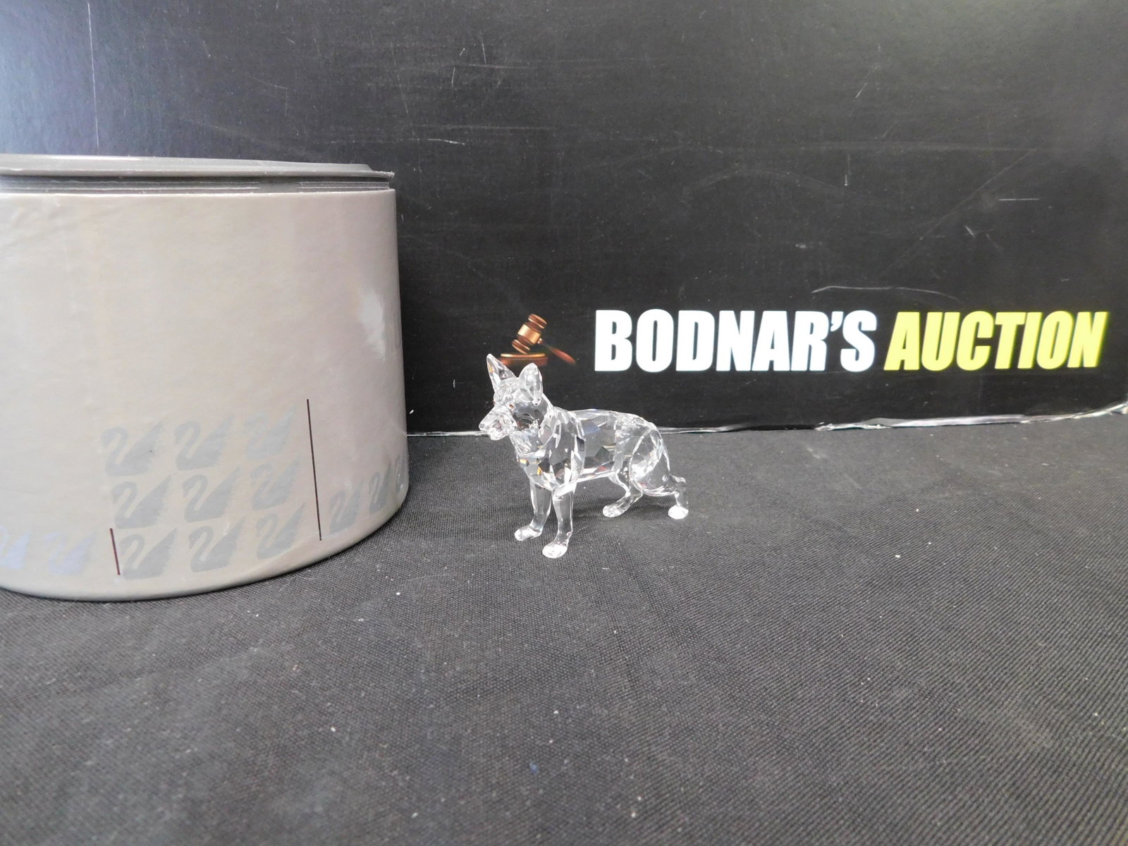 Swarovski Crystal German Shepard: Swarovski Crystal German Shepard. Measures 3" long. We are offering contact-less pick ups at our South Brunswick location by APPOINTMENT ONLY on the Friday, Saturday, Monday and Tuesday immediately fo