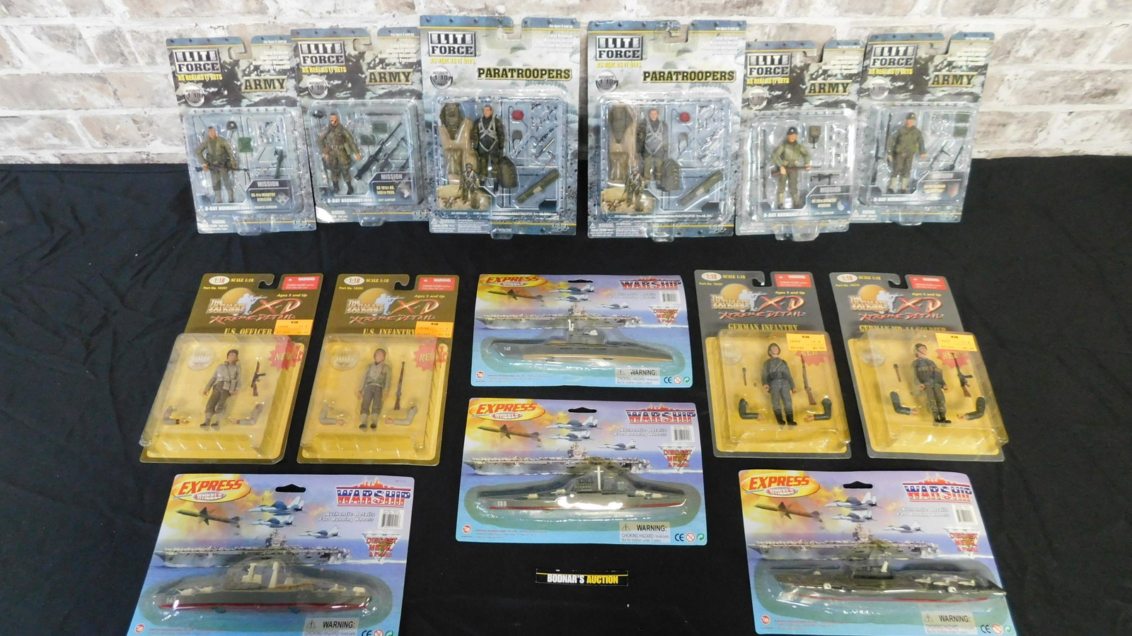 Lot of Military Figures and Warships: Lot of Military Figures including Elite Forces and Ultimate Soldier. Also included are 4 x Express Wheels Warships. The Military Figures are 1:18 Scale. We are offering contact-less pick ups at our So