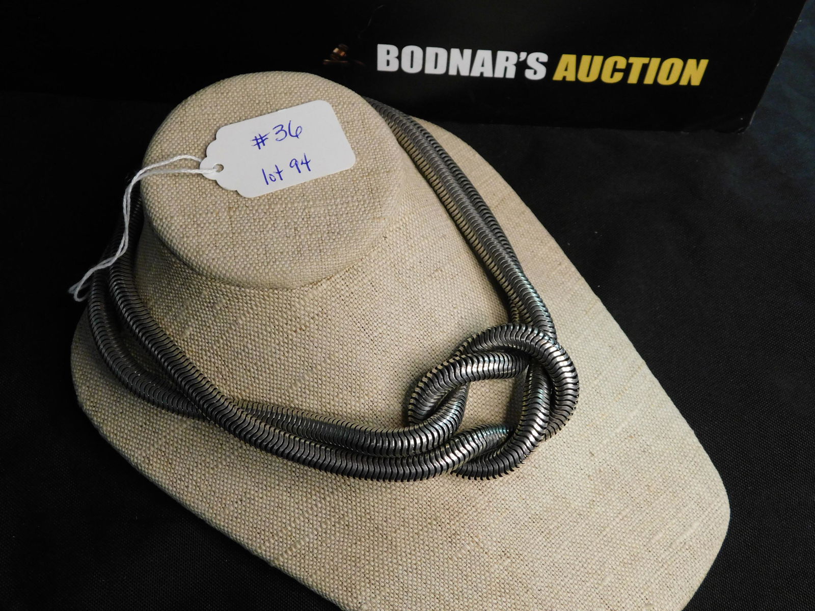 Anne Marie Beretta Snake Chain Choker: Anne Marie Beretta of Paris silver tone snake chain choker necklace. Measures approx. 16". Marked near the clasp. You are bidding at a live sale, please read the terms and conditions. We are offering
