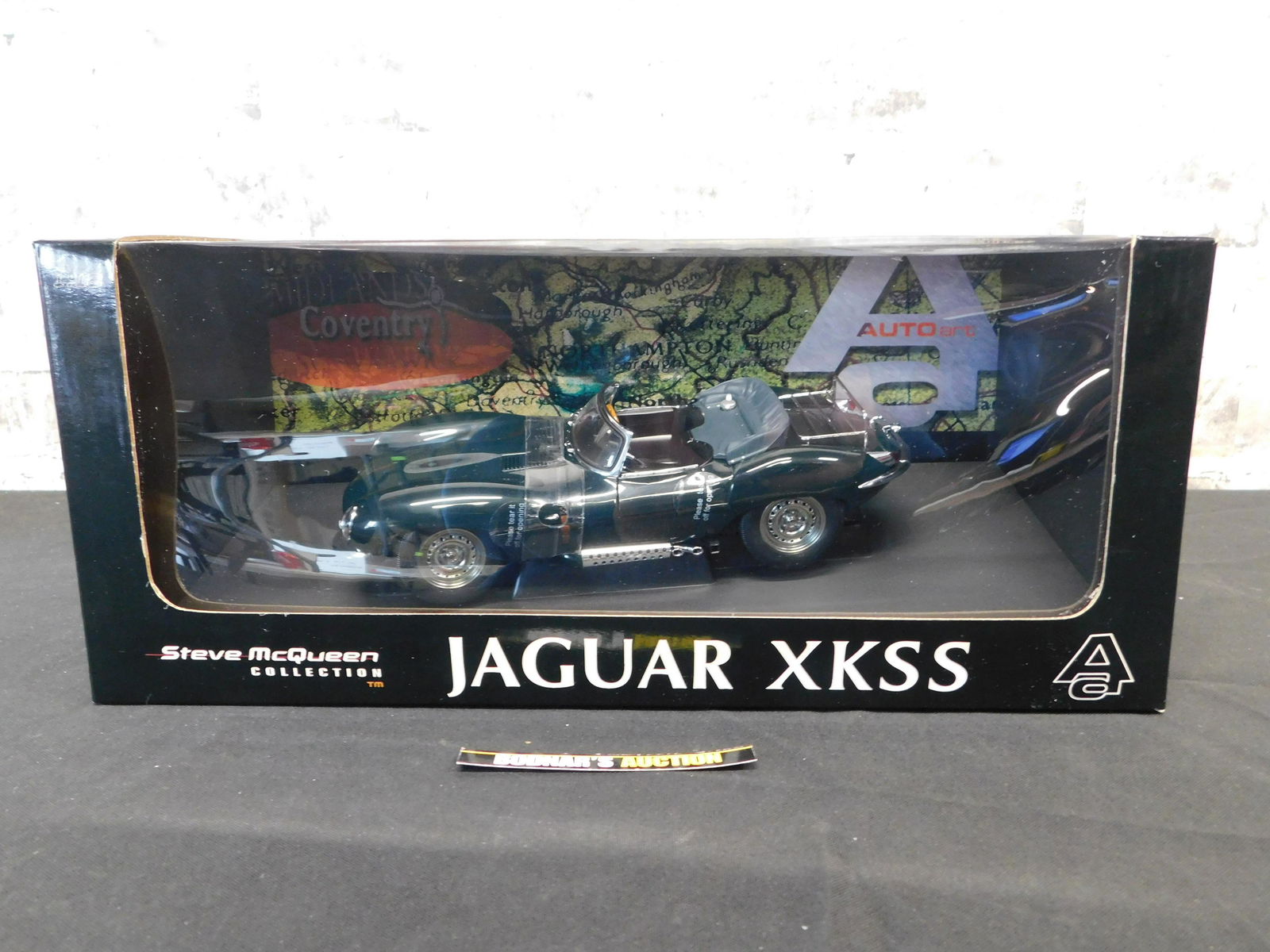 AutoArt Steve McQueen Jaguar XKSS: AutoArt Classic Division The Steve McQueen Collection Jaguar XKSS - 1:18 Scale Die-Cast Car. You are bidding at a live sale, please read the terms and conditions. We are offering contact-less pick ups