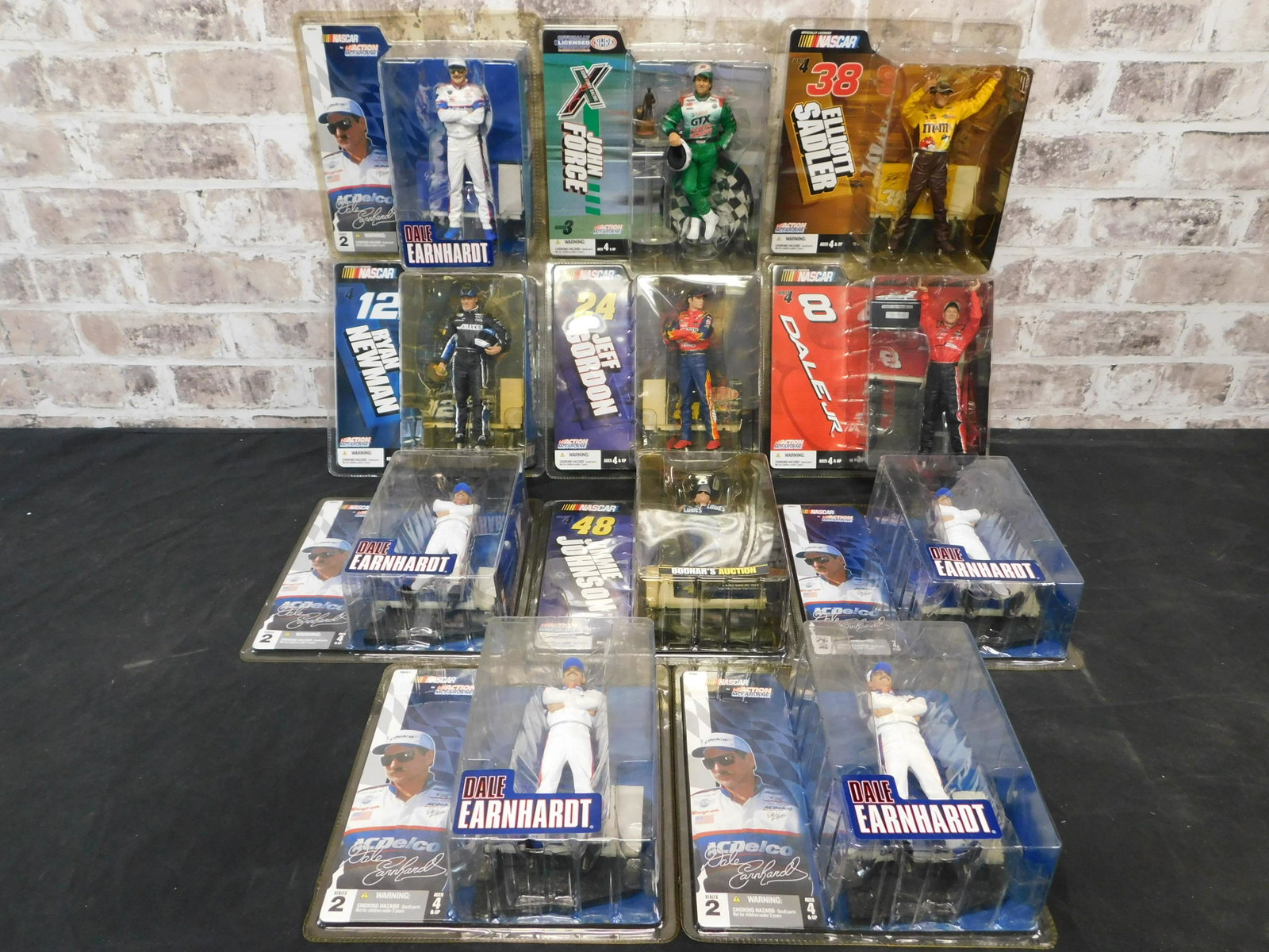 Lot of McFarlane NASCAR Figures: Lot of McFarlane NASCAR Figures including Dale Earnhardt, Jimmie Johnson, Jeff Gordon and More. 11 Pieces Total. You are bidding at a live sale, please read the terms and conditions. We are offering c