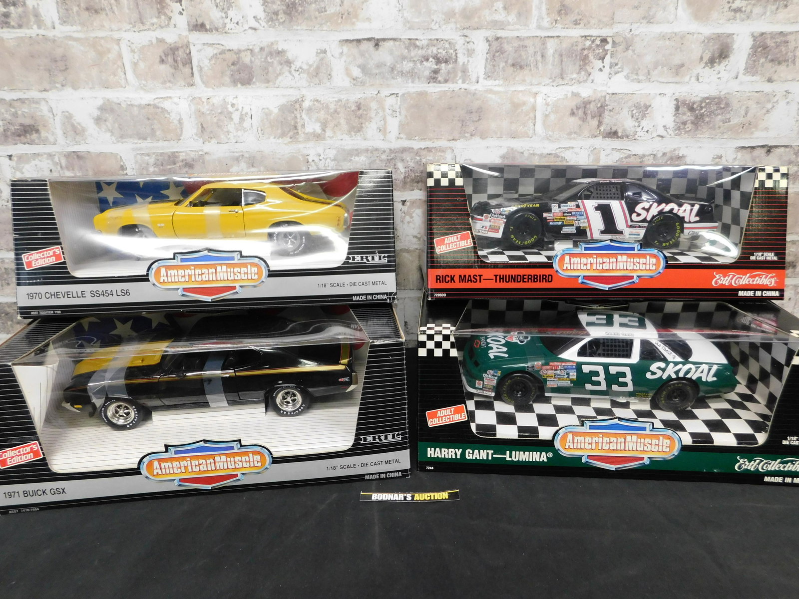 Lot of 4 American Muscle 1:18 Scale Die-Cast Cars: Lot of 4 American Muscle 1:18 Scale Die-Cast Cars. Included in this lot is a 1970 Chevelle SS454 LS6, 1971 Buick GSX, Rick Mast Thunderbird, and Harry Gant Lumina. You are bidding at a live sale, plea