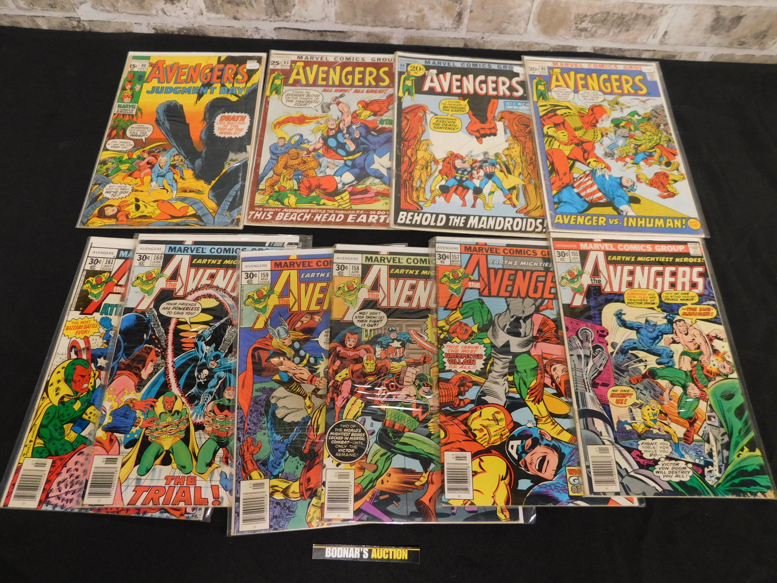 Short Box of Comics including 70's and 80's Avengers,: Short Box of Comics including 70's and 80's Avengers, Defenders and More. This sale will be broadcast live on sale day with an auctioneer and caller calling full descriptions of each lot being sold, a