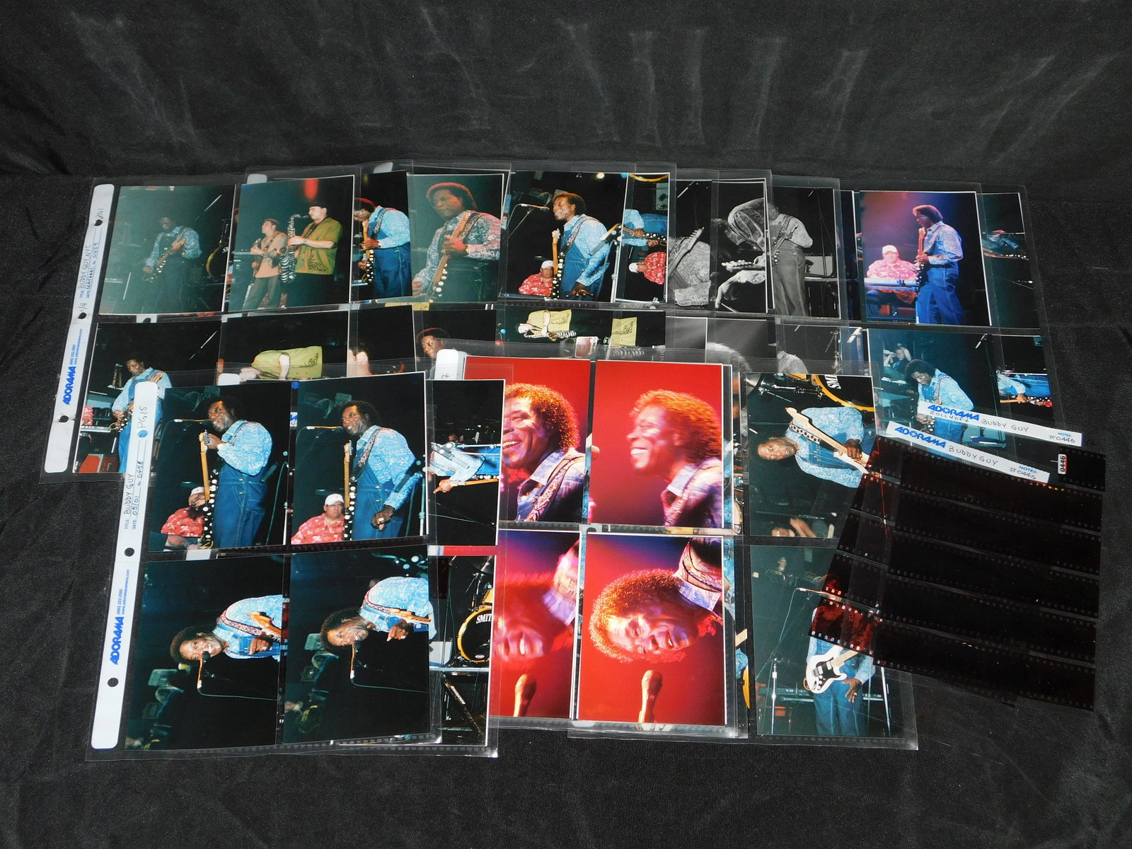 Binder of Photographs of Buddy Guy: Binder of Photographs of Buddy Guy. Most Photos have Negatives included. These photos were taken in NYC May 2001 by Photographer Michael Kazmierczak. The Binder has photos on the front and back of the