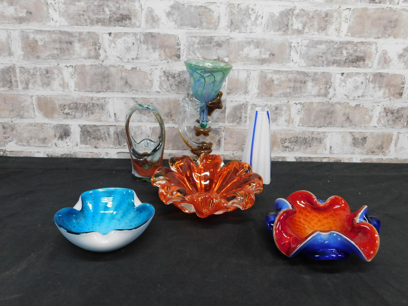 Lot of Murano and Art Glass: Lot of Murano and Art Glass. Measures 2" - 10" tall. This sale will be broadcast live on sale day with an auctioneer and caller calling full descriptions of each lot being sold, as well as video feed 