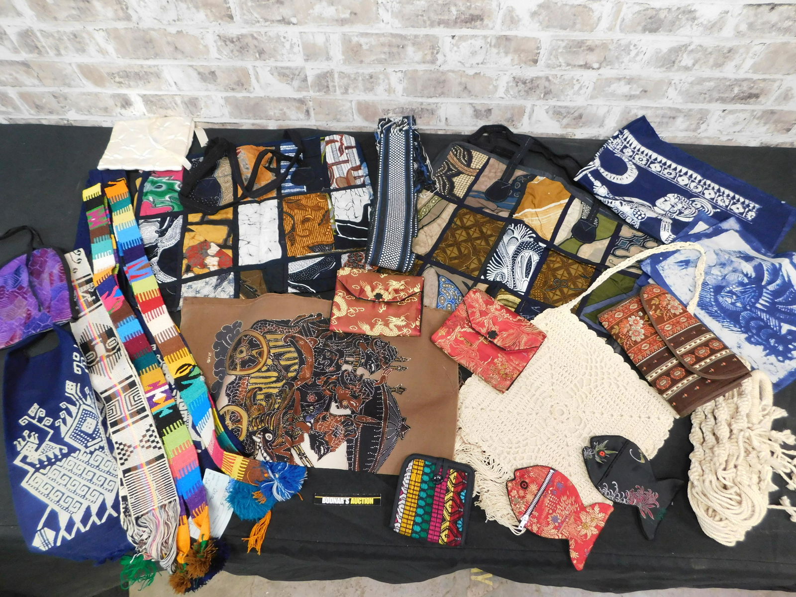 Lot with Purses, Bags, Bandanas and More: Lot with Purses, Bags, Fabric to make Handbags and More. This sale will be broadcast live on sale day with an auctioneer and caller calling full descriptions of each lot being sold, as well as video f