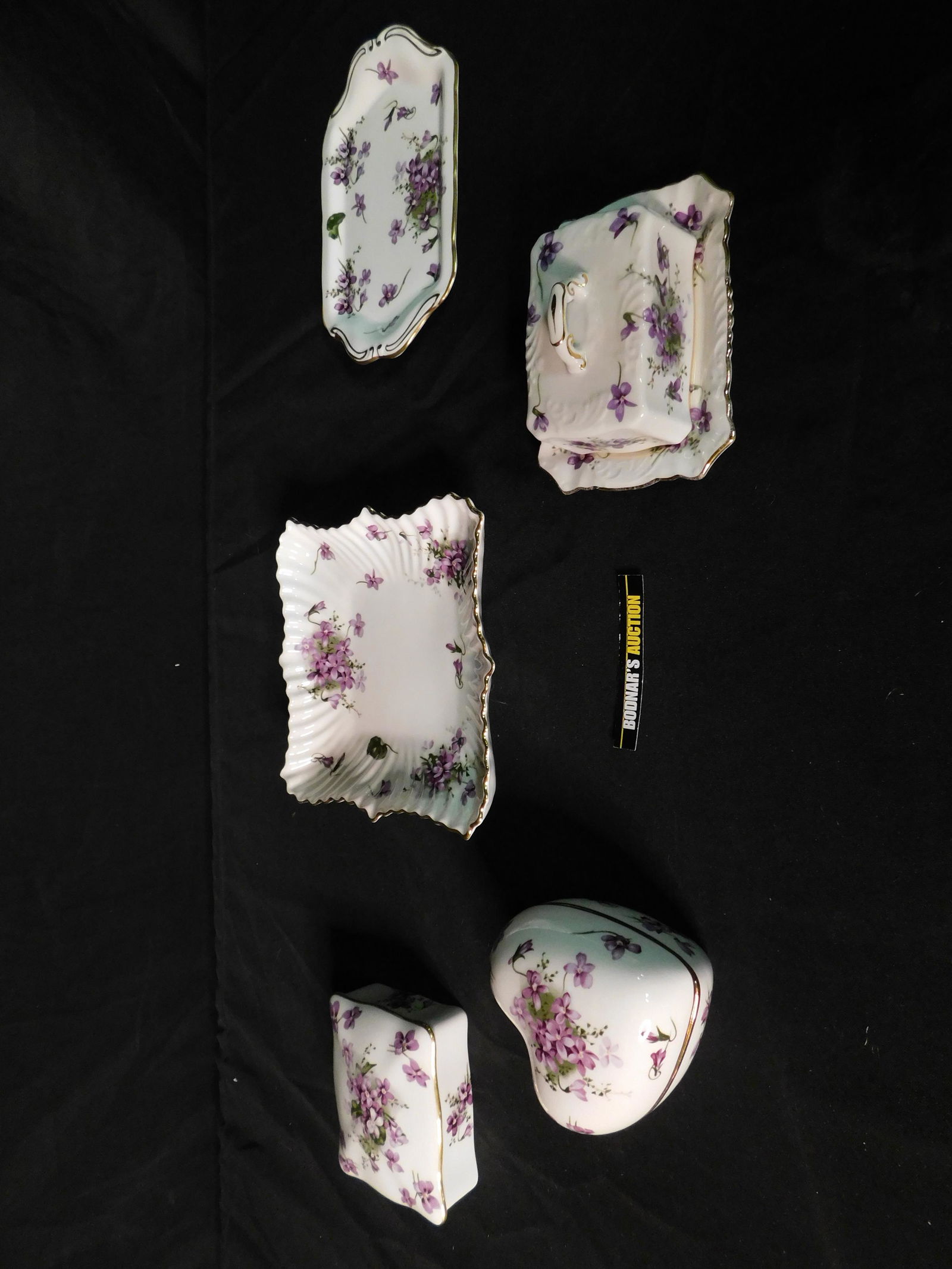 5 Piece Hammersley Victorian Violets Dishes: 5 Piece Hammersley Victorian Violets Dishes. Some are Vanity Items such as covered boxes and dresser tray. Also included is a Butter Dish and Candy Dish. You are bidding at a live sale, please read th