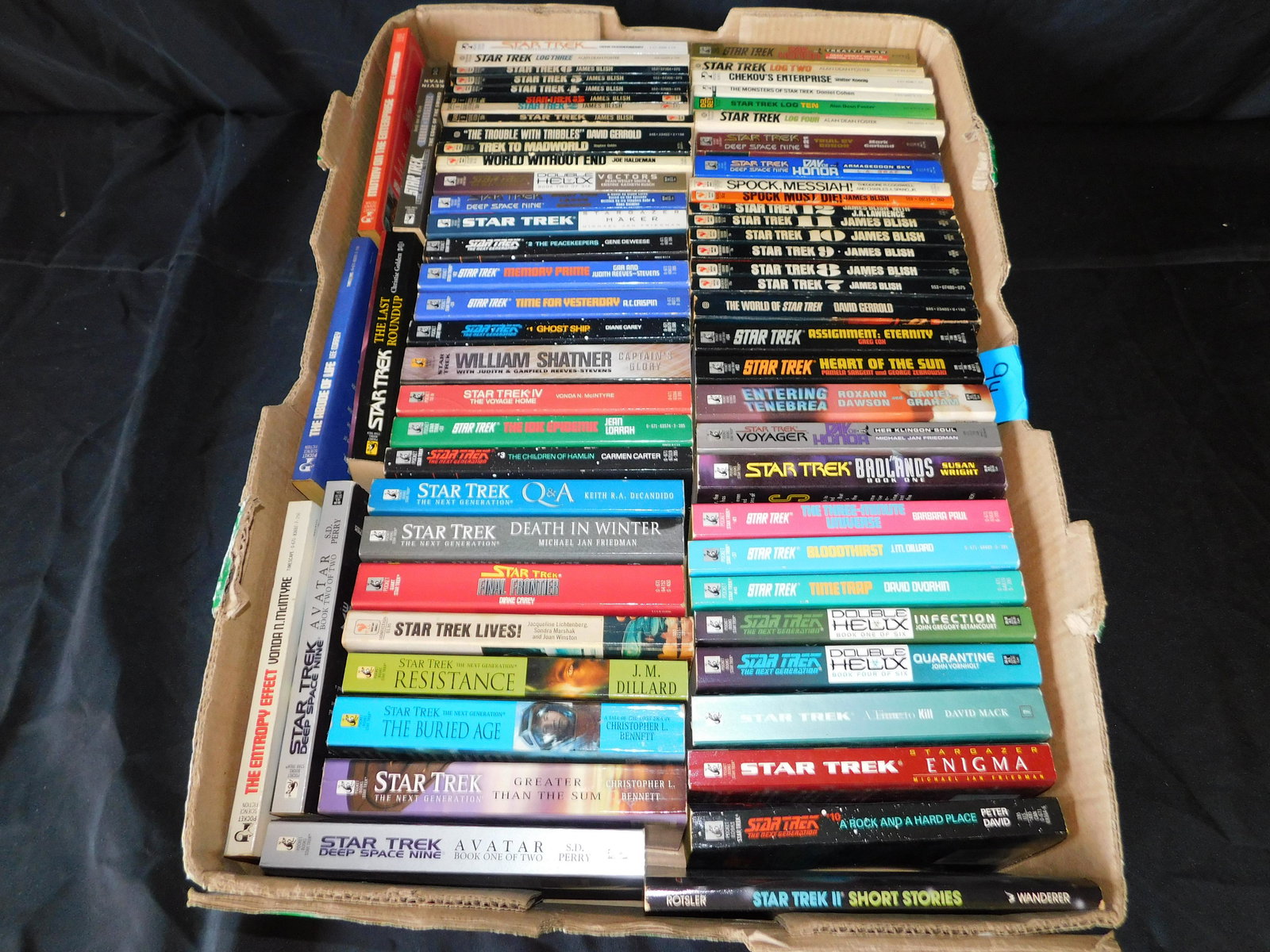 Lot of Star Trek Paperpack Books - 50+ Books: Lot of Star Trek Paperpack Books - 50+ Books. This sale will be broadcast live on sale day with an auctioneer and caller calling full descriptions of each lot being sold, as well as video feed of each