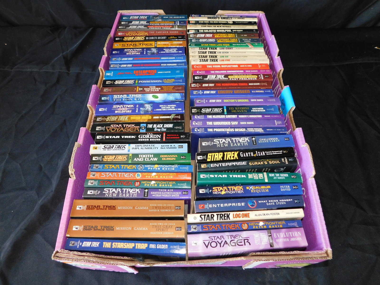 Lot of Star Trek Paperpack Books - 50+ Books: Lot of Star Trek Paperpack Books - 50+ Books. This sale will be broadcast live on sale day with an auctioneer and caller calling full descriptions of each lot being sold, as well as video feed of each