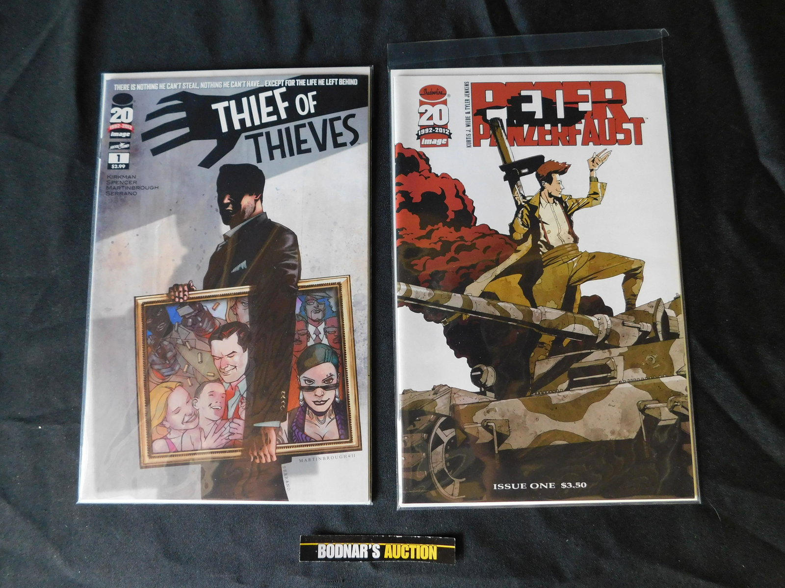Lot of 2 Image #1 Issues - Thief of Thieves and Peter: Lot of 2 Image #1 Issues - Thief of Thieves and Peter Panzerfaust. This sale will be broadcast live on sale day with an auctioneer and caller calling full descriptions of each lot being sold, as well
