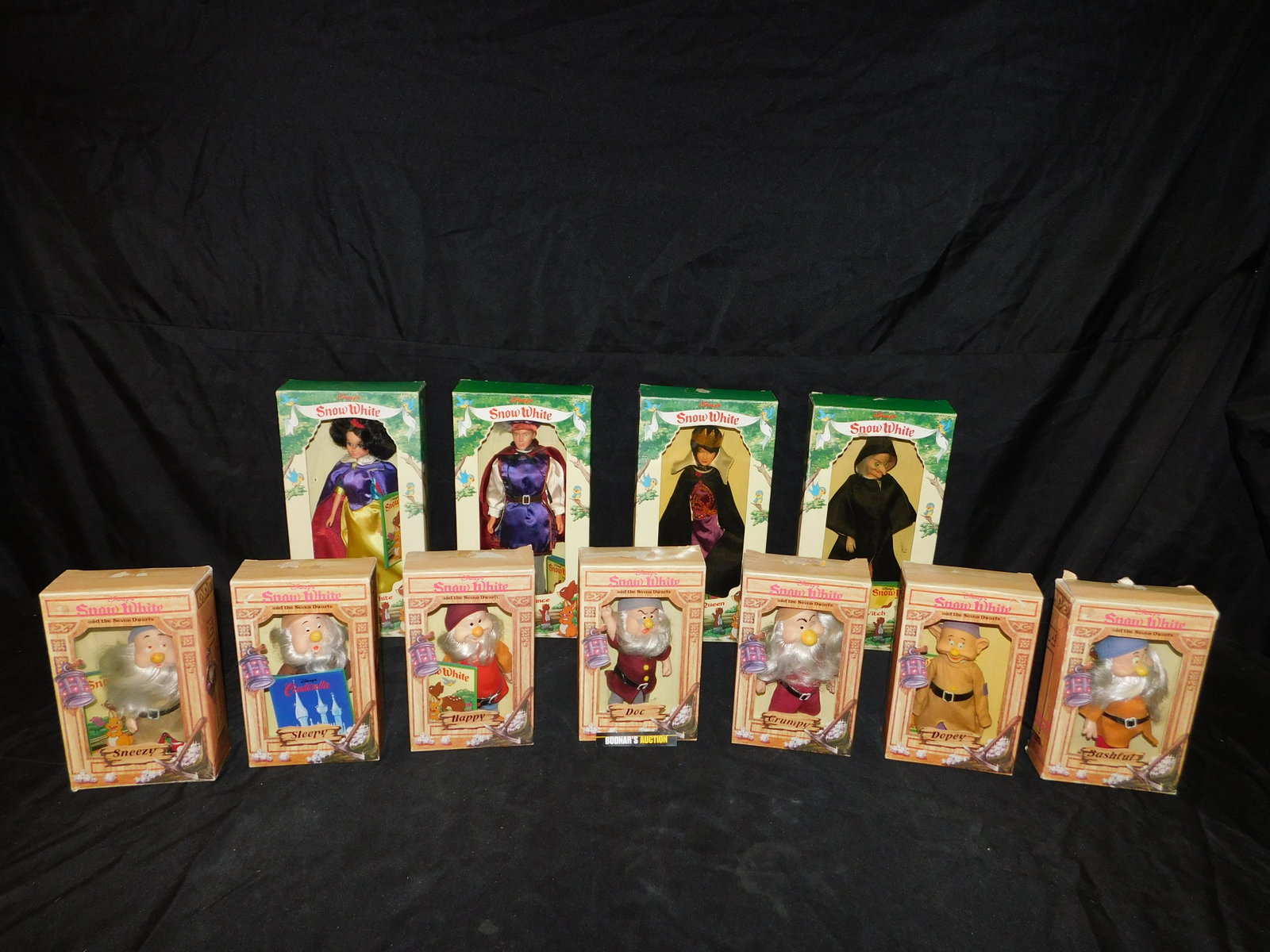 Snow White and The Seven Dwarfs Bikin Doll Set of 11: Snow White and The Seven Dwarfs Bikin Doll Set of 11. All Dwarfs are included plus Snow White, Prince, Evil Queen and The Witch. All come in original boxes. This sale is an in-house shipping sale on m