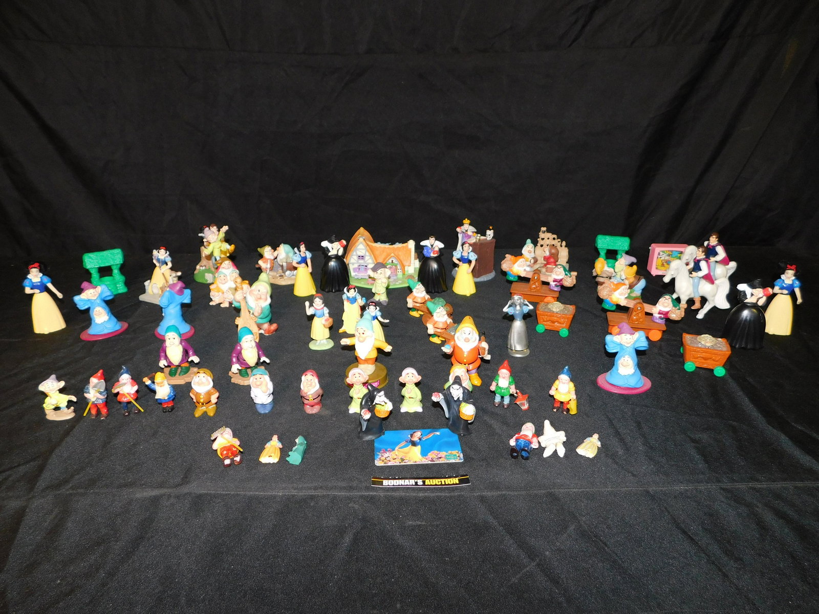 Group Lot of Snow White Toys and PVC Figures: Group Lot of Snow White Toys and PVC Figures. All loose out of packaging. This sale is an in-house shipping sale on most items with a $10.00 per lot packing/handling fee. Please read the Complete Term