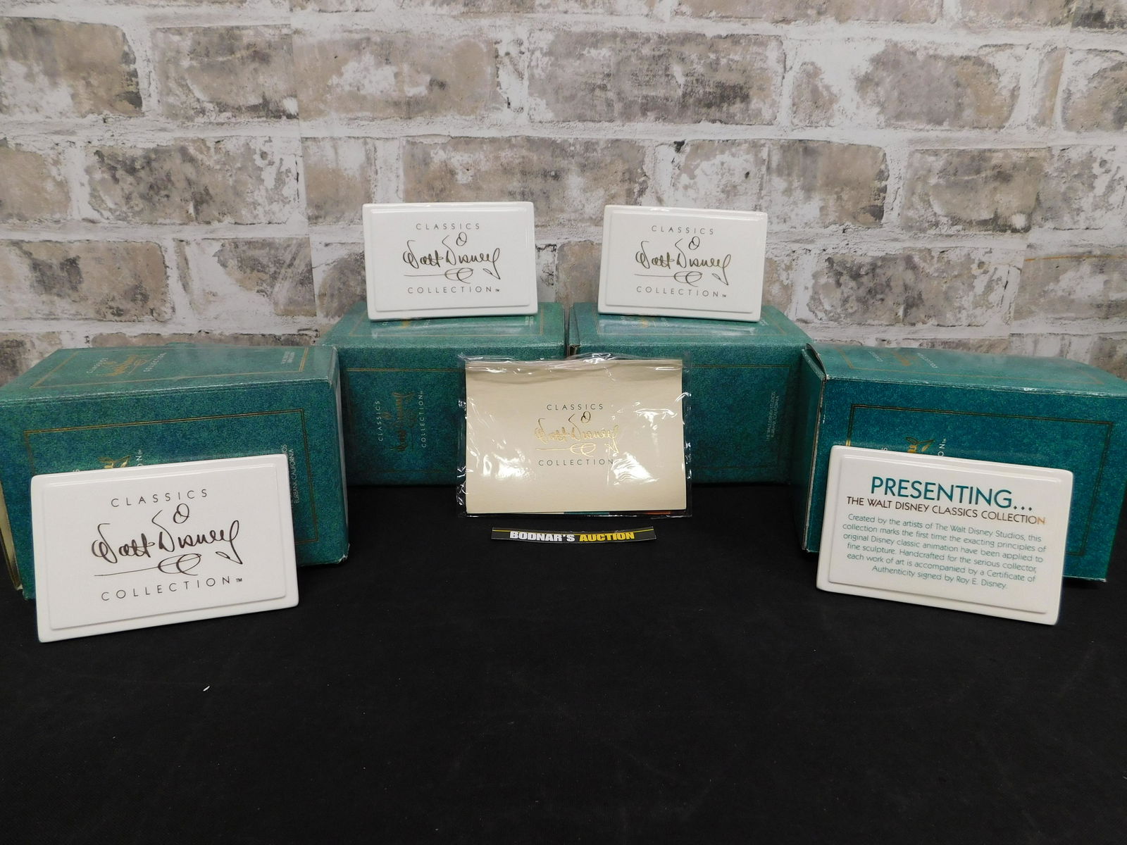 Grouping of 4 WDCC Pieces including Dealer Plaques and (1 of 5)