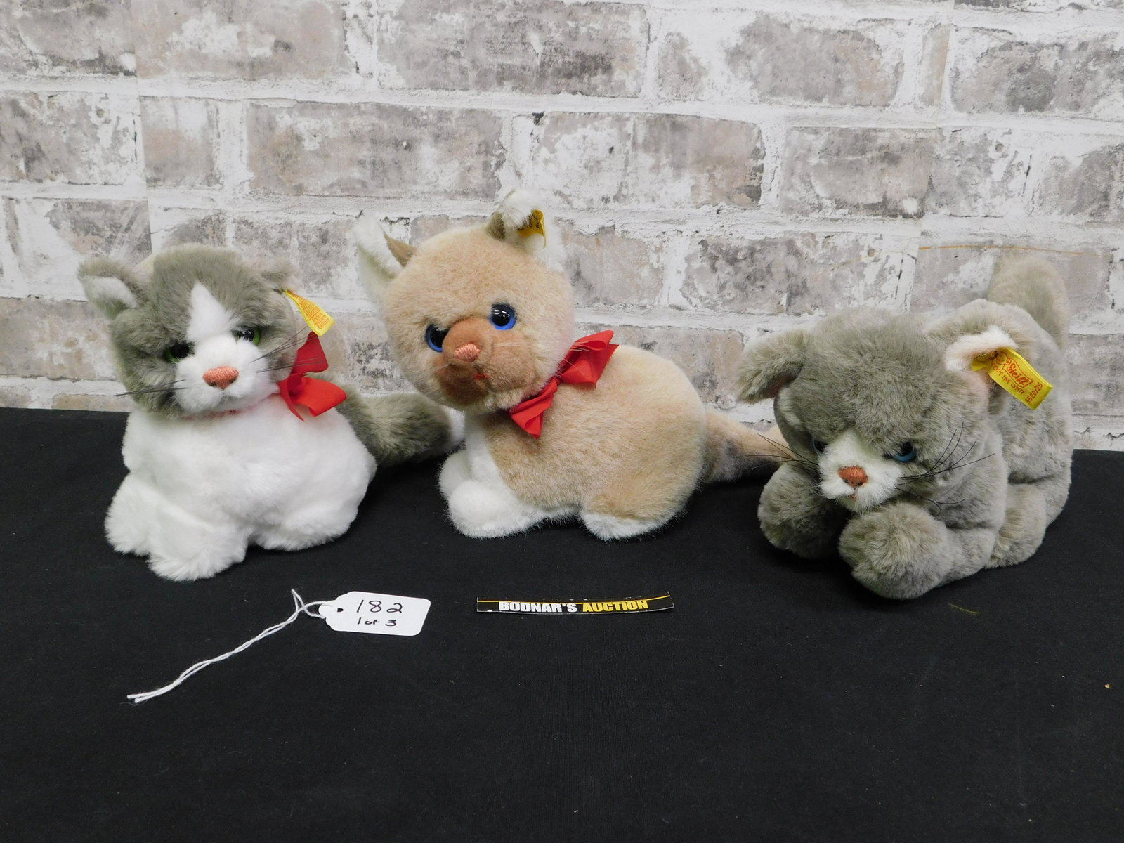 Lot of 3 Steiff Cat Plush: Lot of 3 Steiff Cat Plush. Included are #5520/25, 3520/17, and 2926/16. All measure approx. 6" tall. This sale is an in-house shipping sale on most items with a $10.00 per lot packing/handling fee. Pl