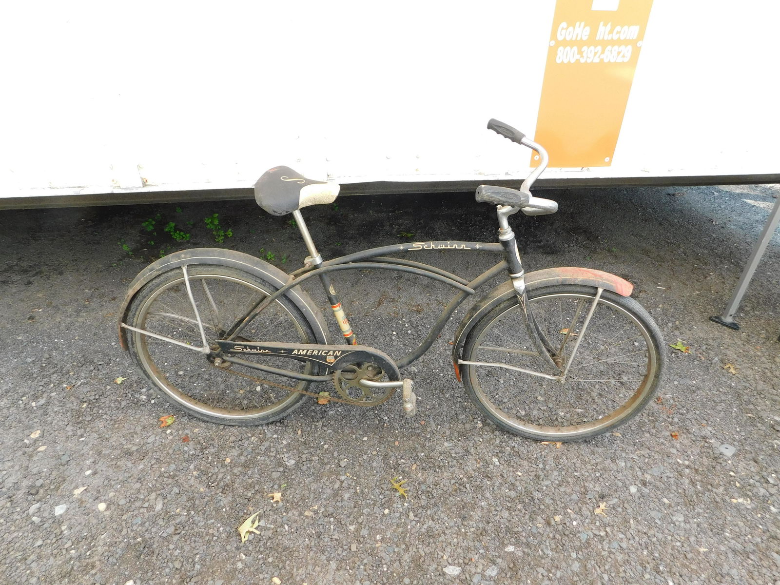 Vintage Schwinn American Bike: Vintage Schwinn American Bike. Fender has paint issues but overall in good condition. Measures 37" tall x 63.5" wide. You are bidding at a live sale. Please read the terms and conditions. This sale wi