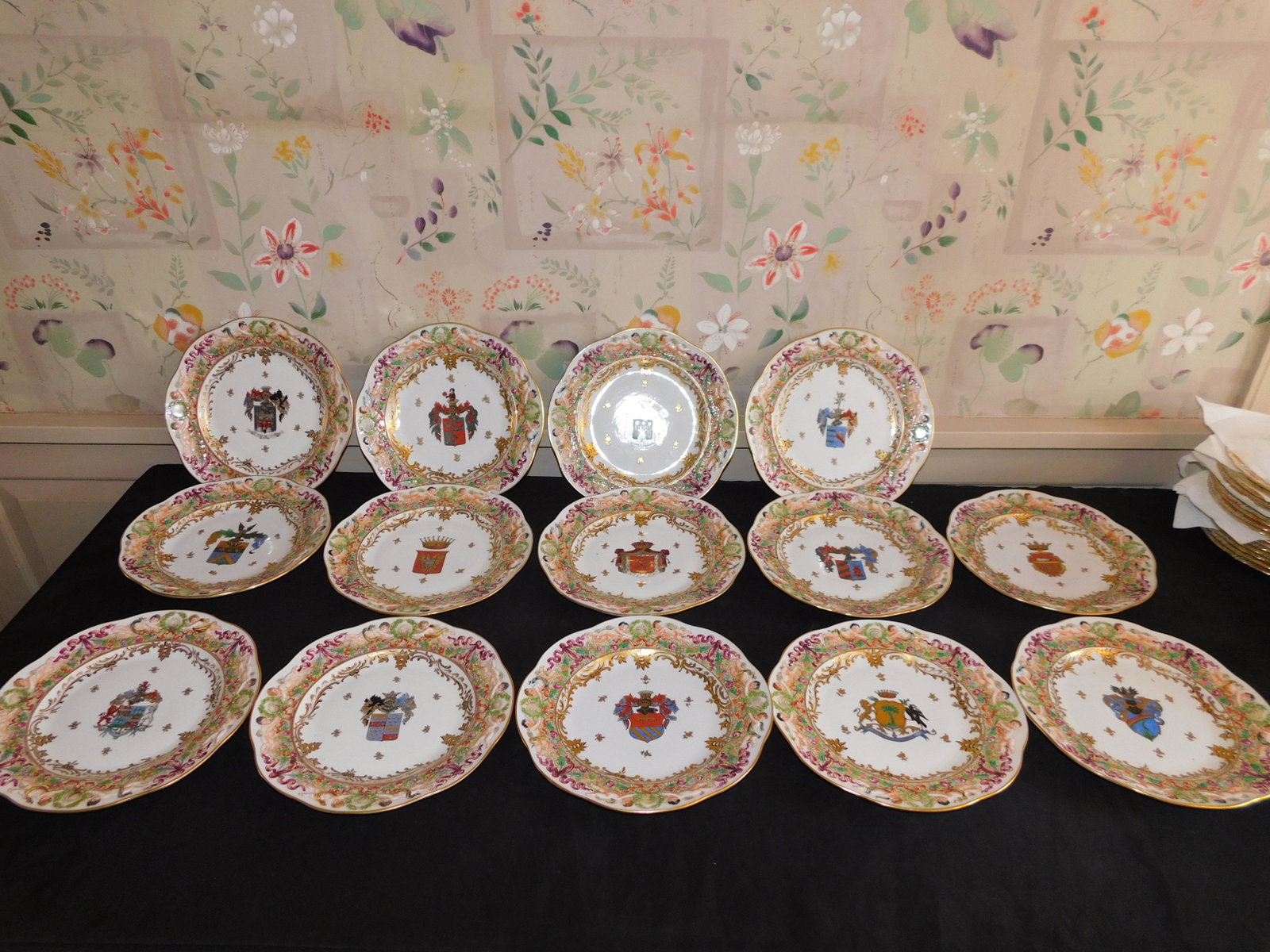 Lot of 14 Capodimonte Plates with Crests: Hand Painted Capodimonte Plates with Crests in Center. 14 Pieces. Measures 11" diameter. This sale is an in-house shipping sale on most items with a $10.00 per lot packing/handling fee. Please read th