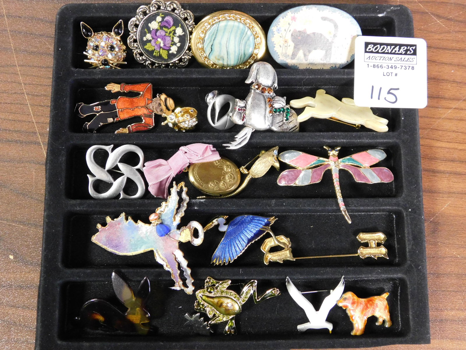 Lot of Pins: Lot of silver tone and gold tone pins. Some enamel and crystal. All items must be paid for within 24 hours of the sale. Local pickups are in our South Brunswick location on Thursday, Friday, Saturday